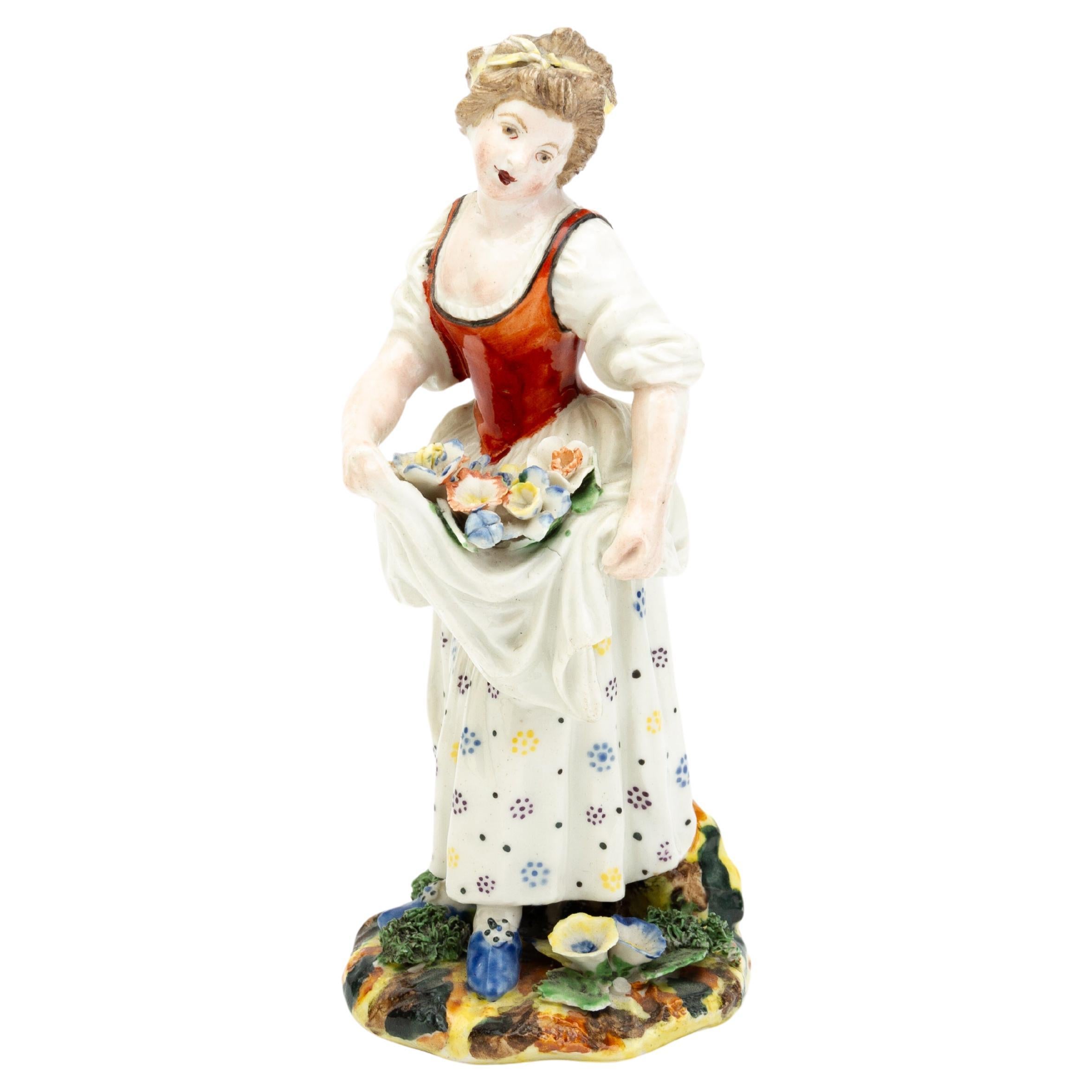 Polychrome Porcelain Figure of a Lady Collecting Flowers 19th Century