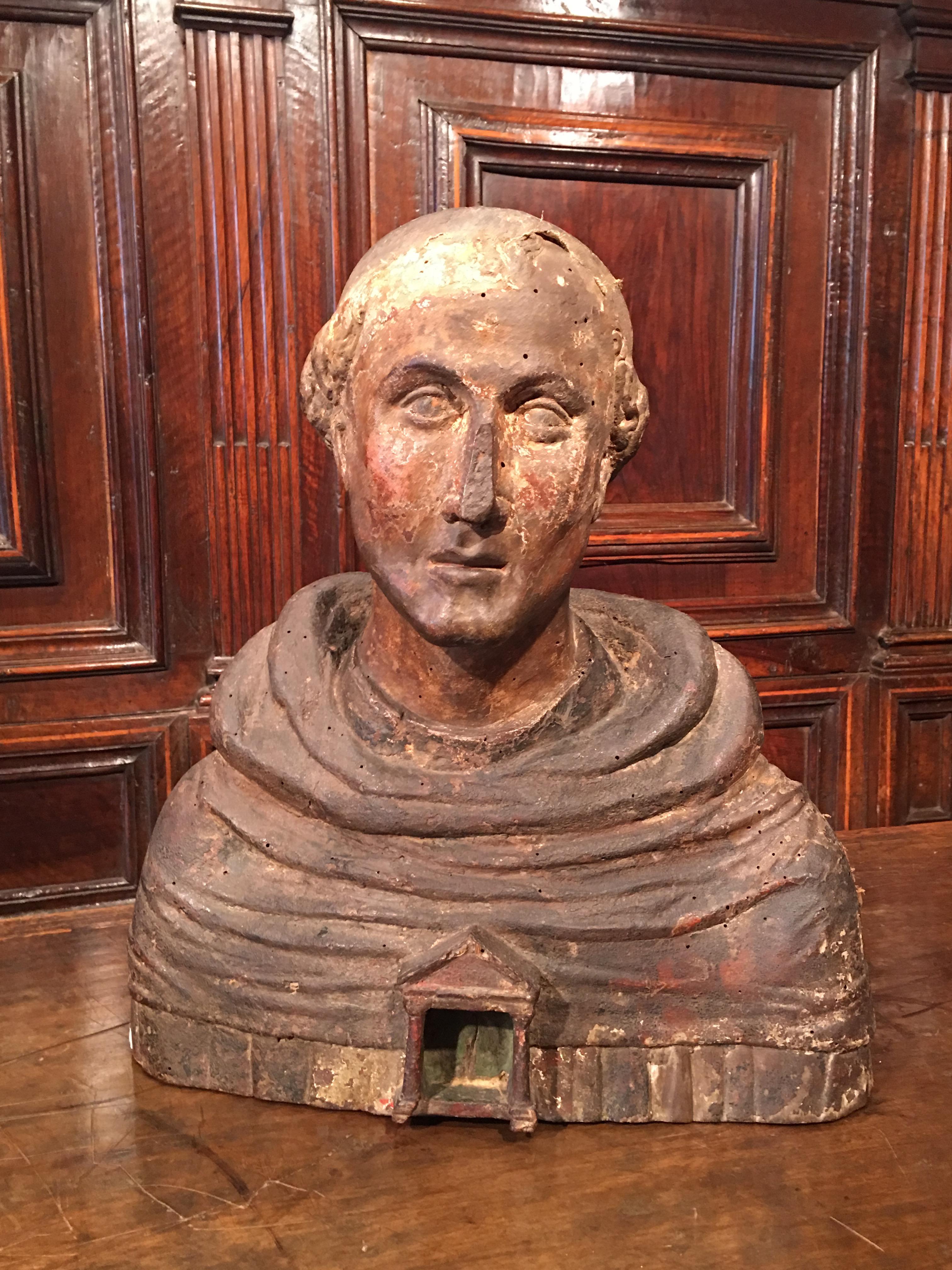 Origin : Italy
Period : Late 15th-early 16th century

Measures: Height 50 cm
Length 42 cm
Depth 15 cm

Good condition
Traces of polychromy and gilt

The monk is depicted with an oval face, marked with high and strong cheekbones, sunken