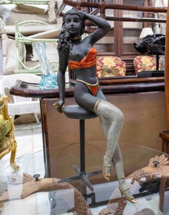 Polychrome Sculpture of a Seated Female Figure