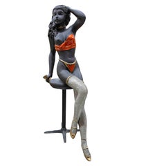 Polychrome Sculpture of a Seated Female Figure