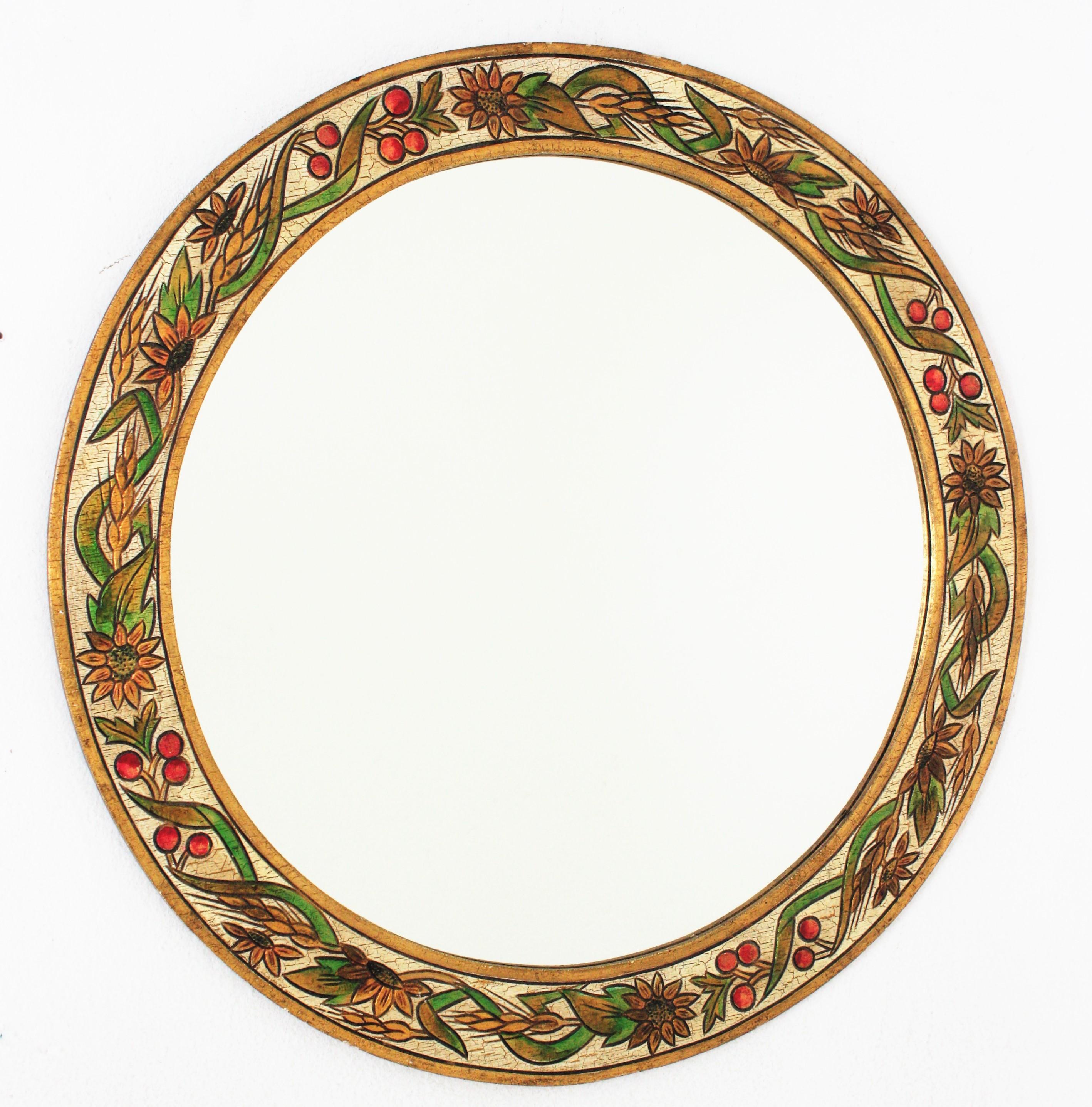 Round wall mirror in Pyrography polychrome wood, Spain, 1960s.
Beautiful handcrafted round mirror with pyrography and hand-painted decoration of leaves, fruits and flowers on the frame.
A colorful addition to any countryside house, beach house or