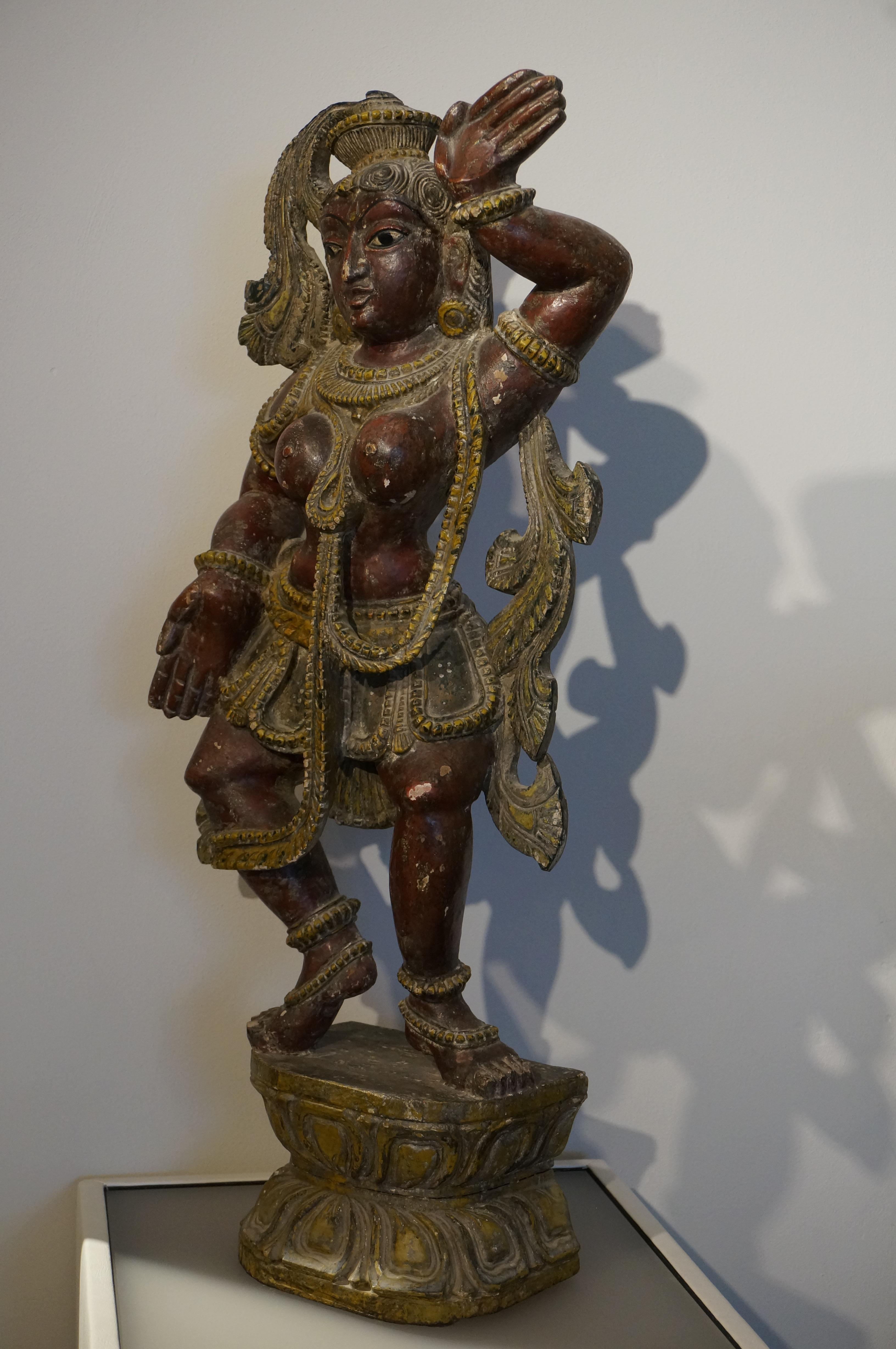 19th Century Polychrome wooden Hindu sculpture of a celestial dancer, India, 19th century. For Sale