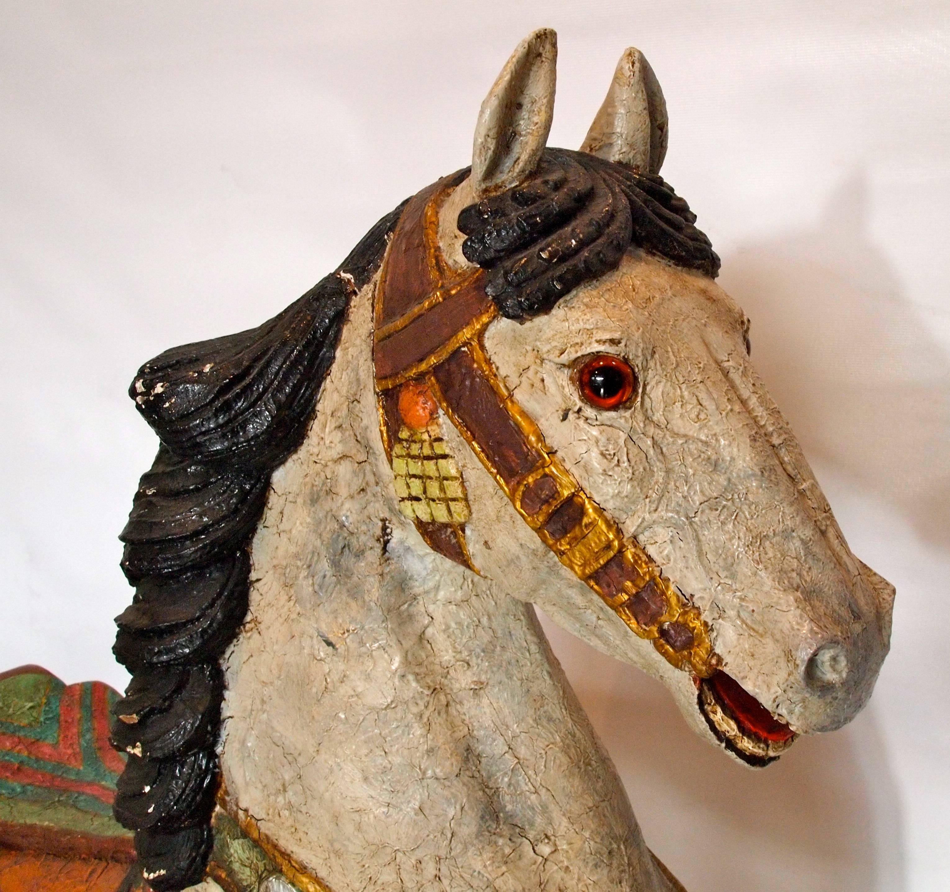 Nicely carved and colorfully painted carousel horse 'Apache'. Beautiful expressive face with lifelike glass eyes.
French or German carved
Early 20th century.