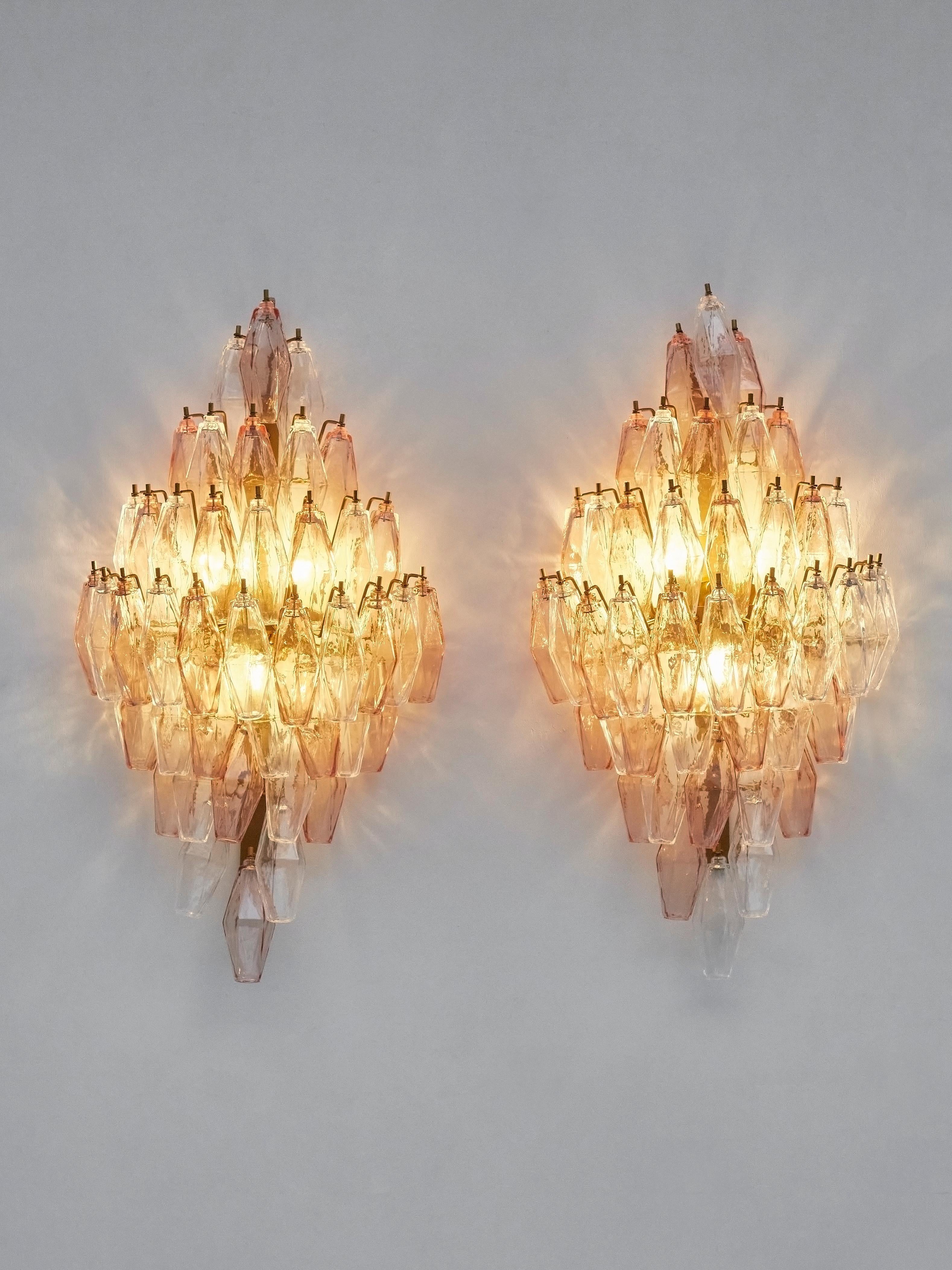 Superb pair of wall sconces with Polyedri glasses in murano.
Creation by Studio Glustin.