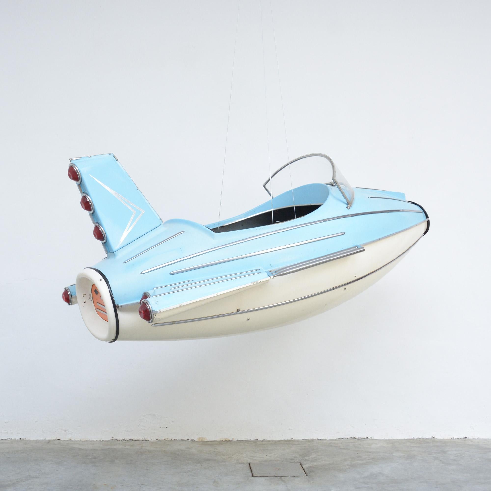 This light blue toy rocket plane once belong to a carousel of the 1960s.
It is made of polyester with metal and plastic details. This exceptional piece is in very good condition. It will be an awesome eyecatcher in any interior.