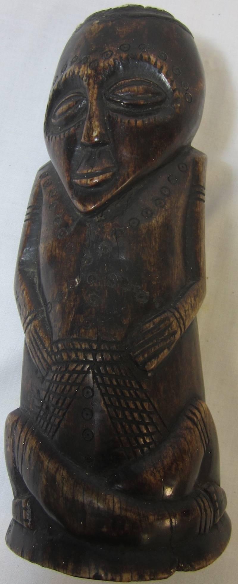 Polynesian carved bone figure, 
circa 1900.