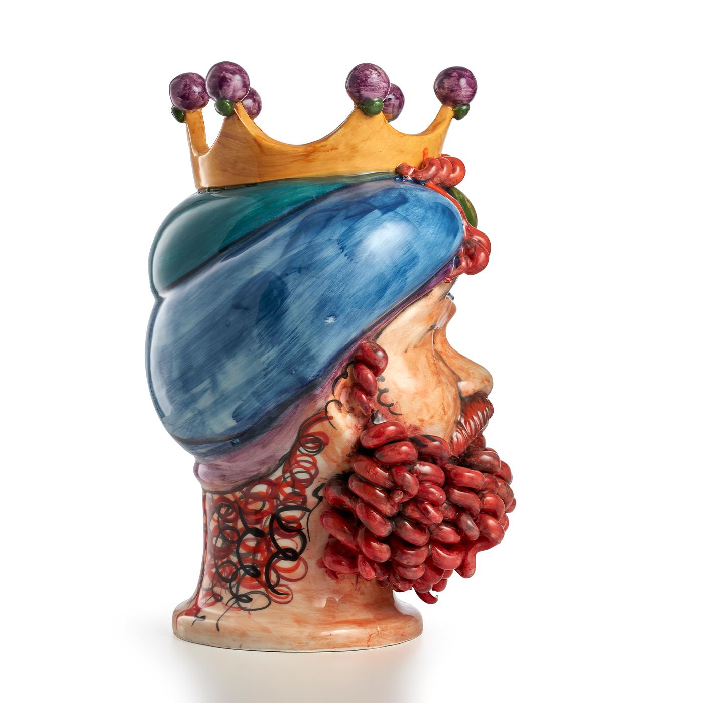 This elegant and exotic Polyphemus evokes all the myth’s brutal and instinctive strength, pulling the viewer in an emotionally disarming imagination. This gorgeous majolica sculpture is a modern interpretation of the Sicilian Moor's head which has