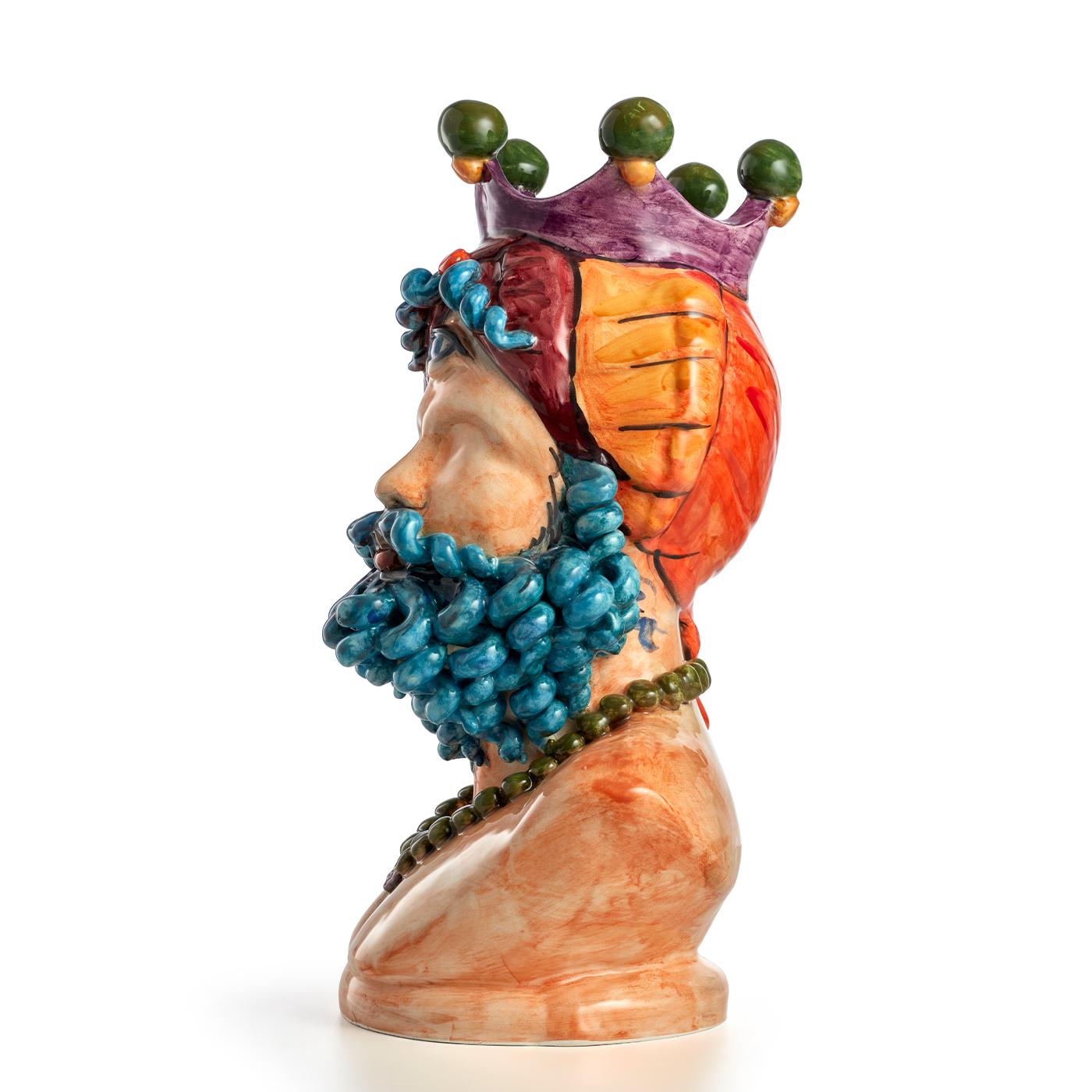 This elegant and exotic Polyphemus evokes all the myth’s brutal and instinctive strength, pulling the viewer in an emotionally disarming imagination. This gorgeous majolica sculpture is a modern interpretation of the Sicilian Moor's head which has