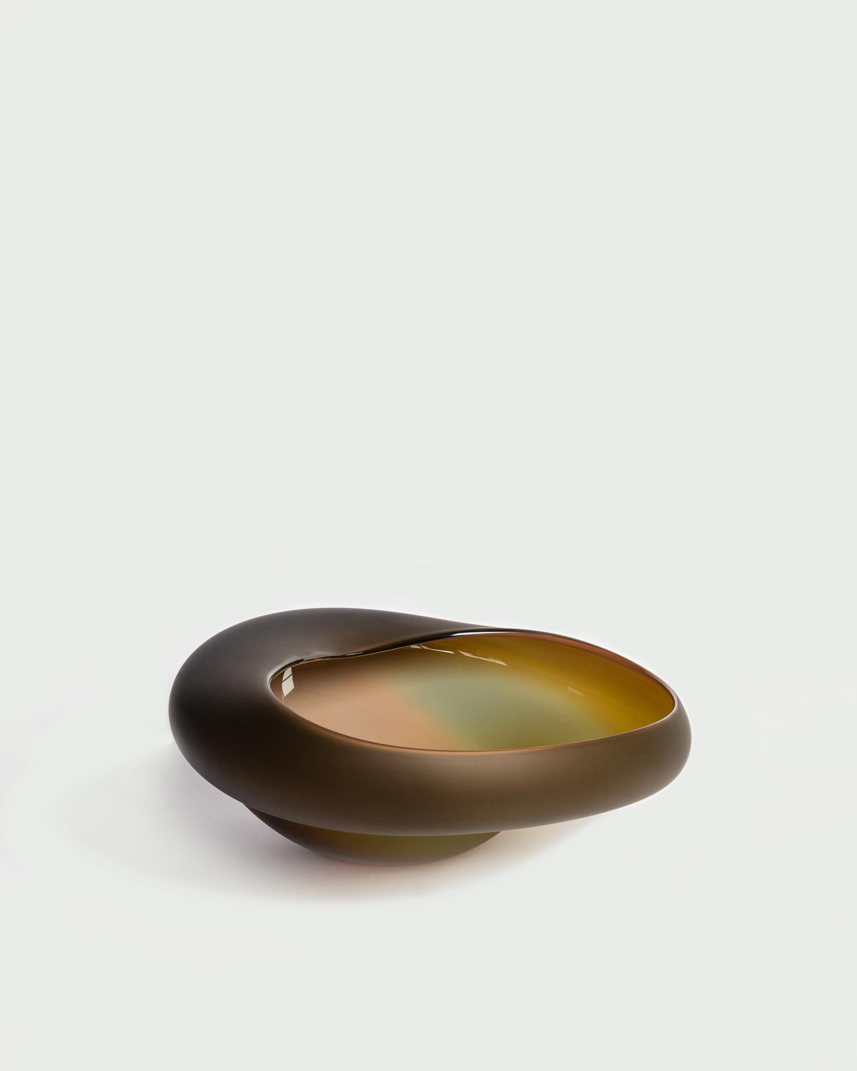 Polypore Large Bowl by David Valner
Dimensions: D 32 x W 38 x H 17 cm.
Materials: Hand-crafted glass.
Weight: 5 kg.
Finish: Large size, Dark green and beige, and matte surface.

In the world of poroid fungi, polypores coexist with the boletus from