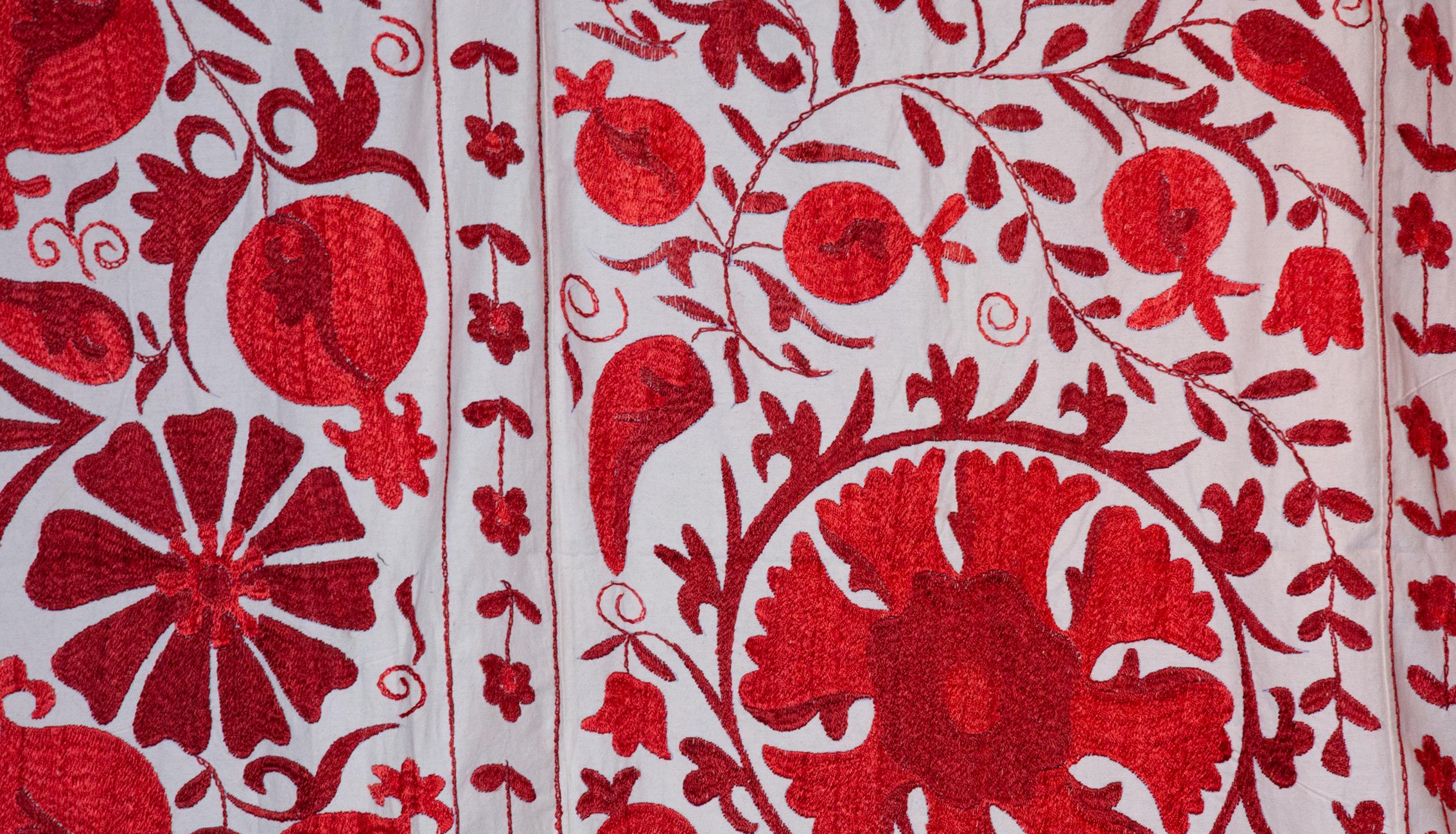 Pomegranate Suzani I. Handmade cotton Suzani with pomegranate designs. Measures: 57