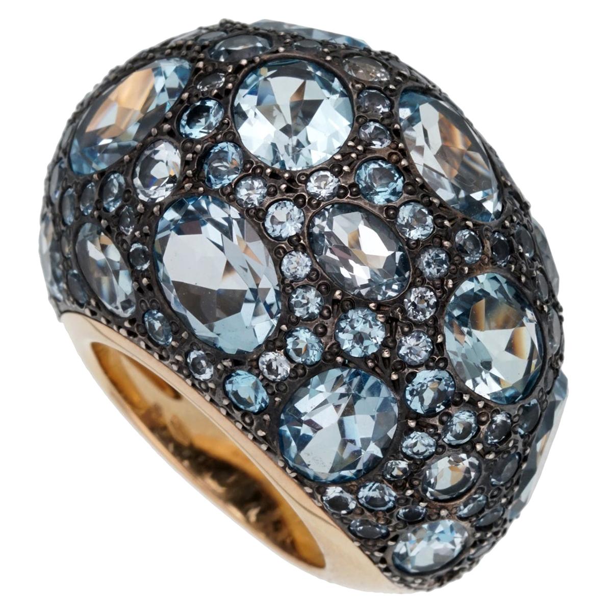 A magnificent bombe style brand new ring by Pomellato showcasing 12ct of multiple shaped topaz set in shimmering 18k rose gold. The ring measures a size 5 3/4 and can be resized.

Pomellato Retail Price: 9000
Sku: 2459