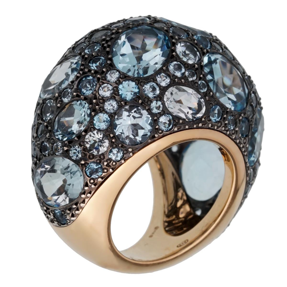 A magnificent bombe style brand new ring by Pomellato showcasing 12ct of multiple shaped topaz set in shimmering 18k rose gold. The ring measures a size 5 3/4 and can be resized.

Pomellato Retail Price: 9000
Sku: 2458