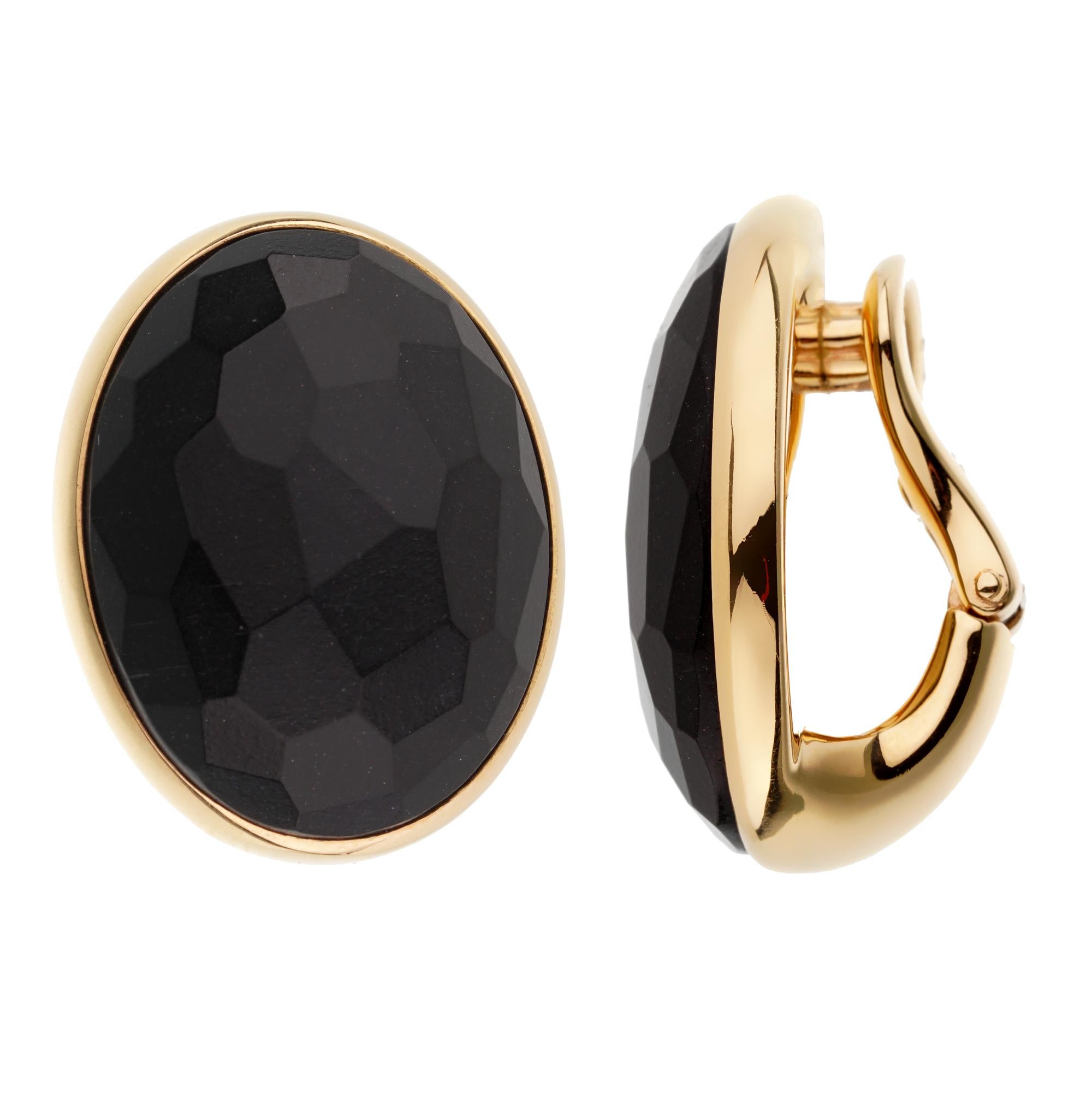 A fabulous pair of authentic Pomellato earrings set with faceted .Black Jet totaling 17.90ct in 18k rose gold. The earrings measure .80