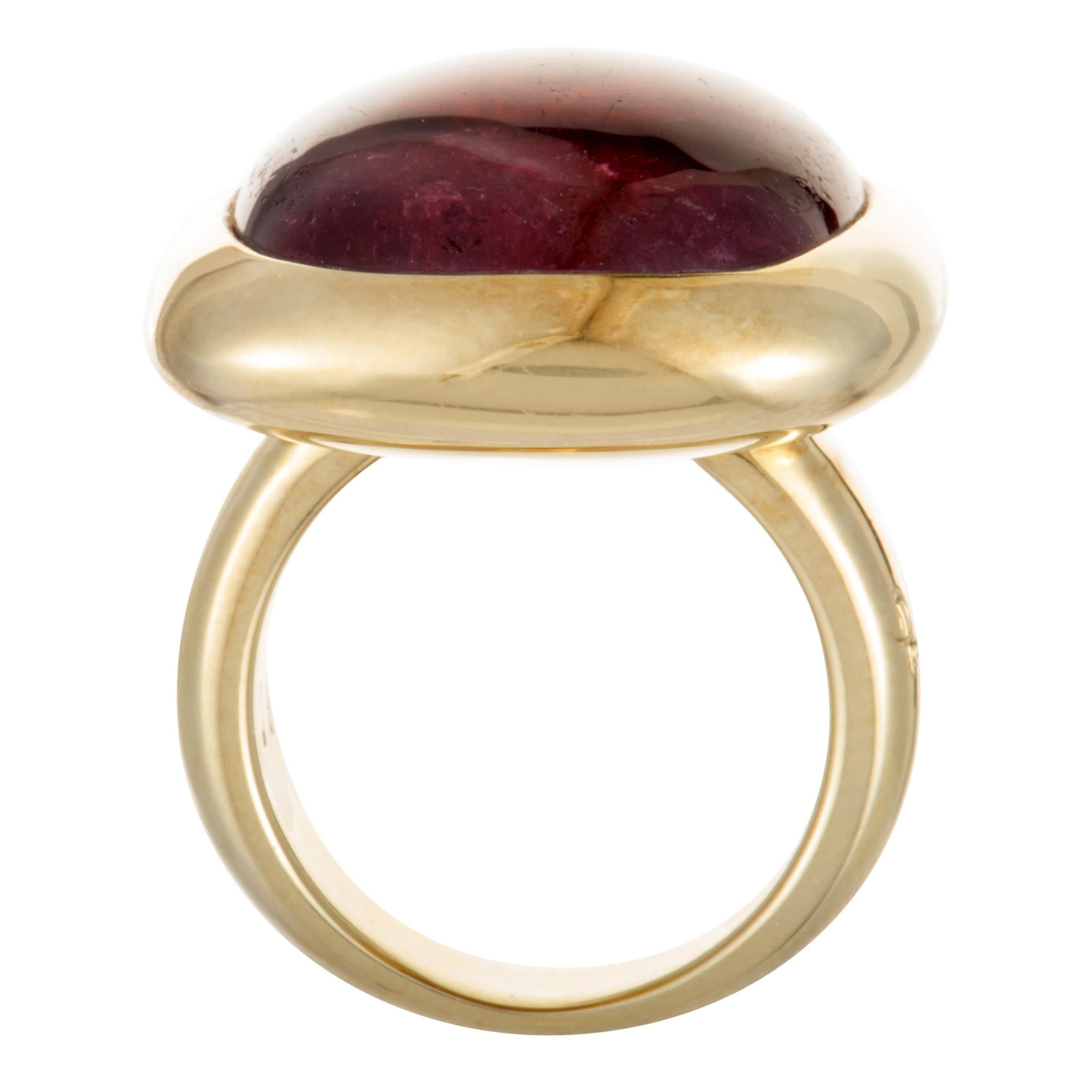 The seductive pink tourmaline lends its irresistible allure to this majestic ring that is designed by Pomellato in a wonderfully prestigious fashion. The ring is crafted from 18K yellow gold and weighs 30 grams.
Ring Top Dimensions: 28mm x 23mm