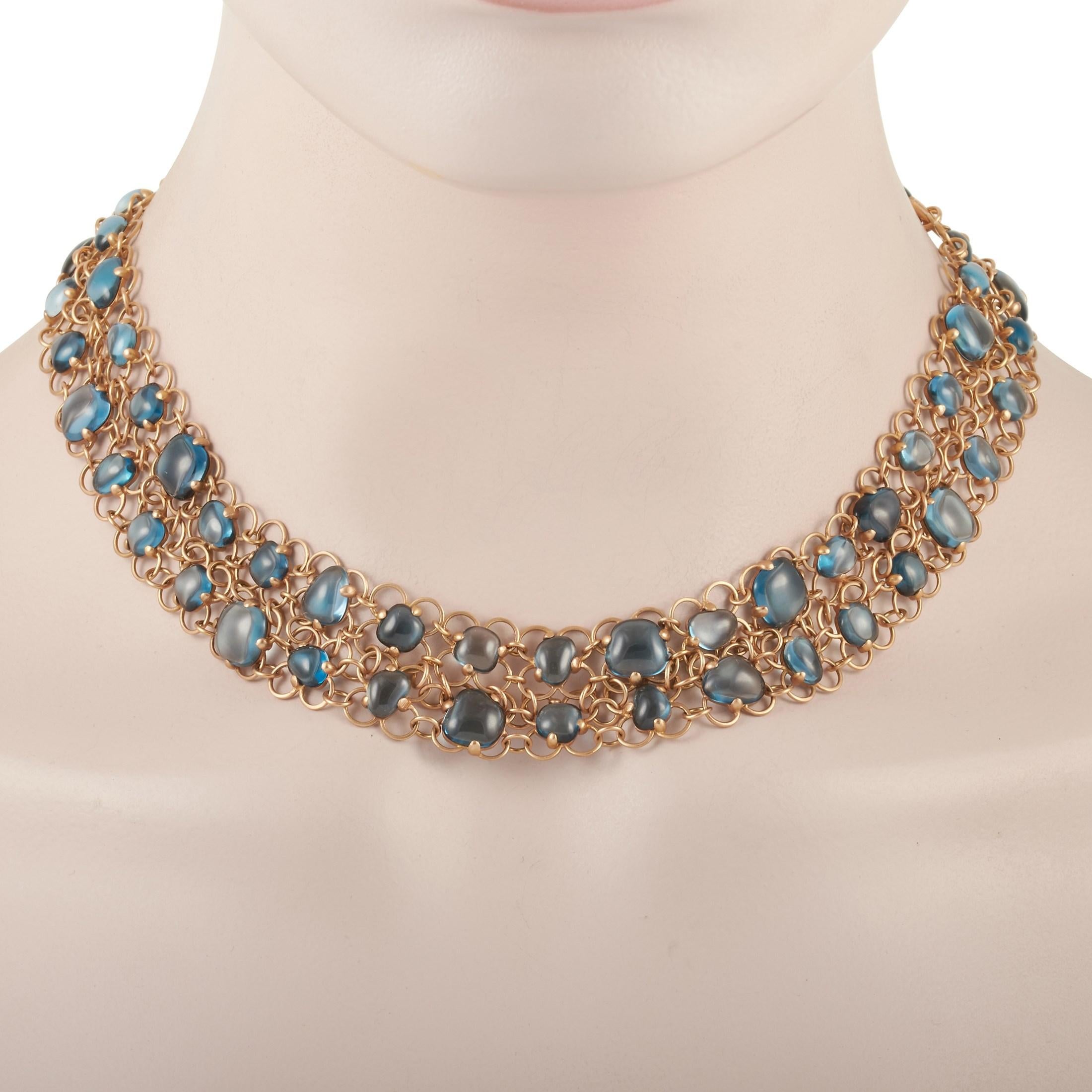 Symbolizing infinite variations of rhythm and elegance, this Pomellato necklace is masterfully crafted with 18K yellow gold and adorned with beautiful topaz stones. Weighing 64.4 grams, this flawless piece measures 18 inches in length. 