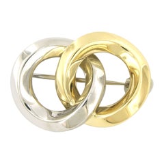 Spilla Pomellato in oro bicolore 18 carati, 14,3 grammi, design moderno