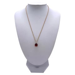 Pomellato Halskette mit Anhänger aus 18-karätigem Gold, „Nudo Petit“, mit rotem Granat und Diamanten