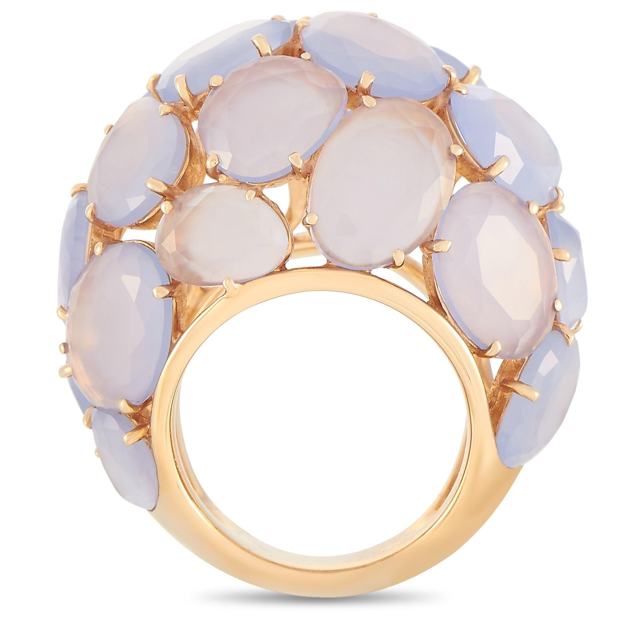 This glitzed up dome ring is one you can count on when you need to spruce up your look. The Pomellato 18K Rose Gold Capri Chalcedony Dome Cocktail Ring features a wide 7mm band with 22mm by 30mm top dimensions. Set with a strong healing stone -