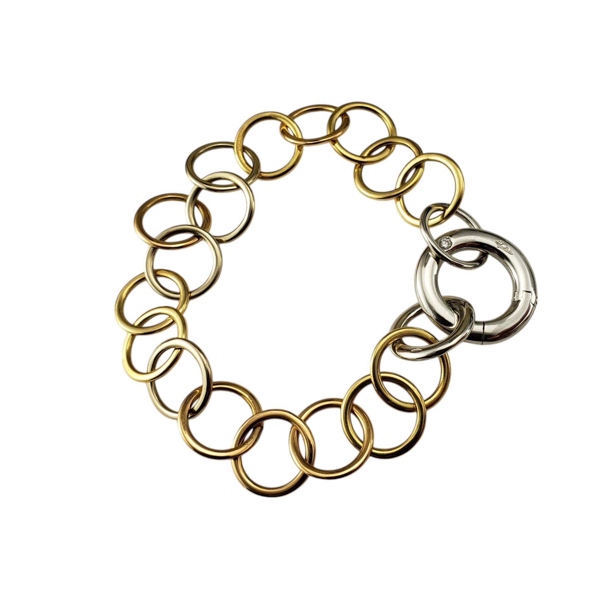 Pomellato 18K Tricolor Gold and Diamond Lucciole Link Bracelet-

This stunning Lucciole bracelet by Pomellato is composed of 18K domed rings in yellow and white and subtle rose gold. The dome shaped clip clasp is decorated with one round brilliant