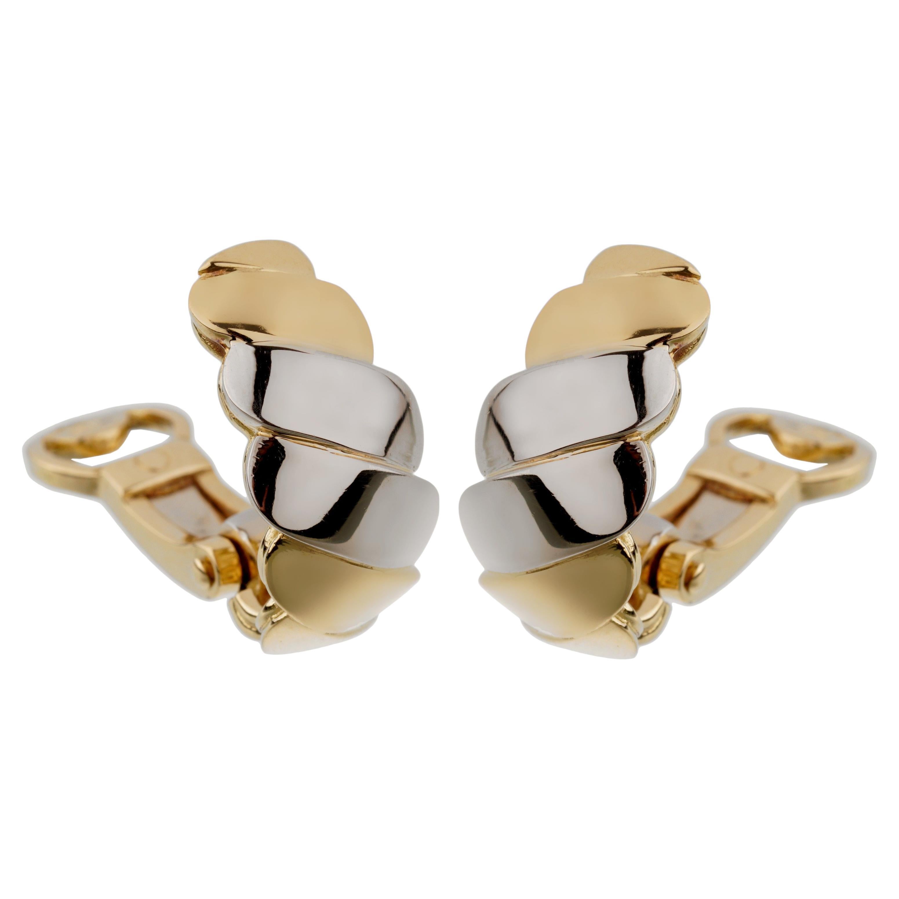 Orecchini a clip in oro bianco giallo a onde di Pomellato 18 ct. in vendita