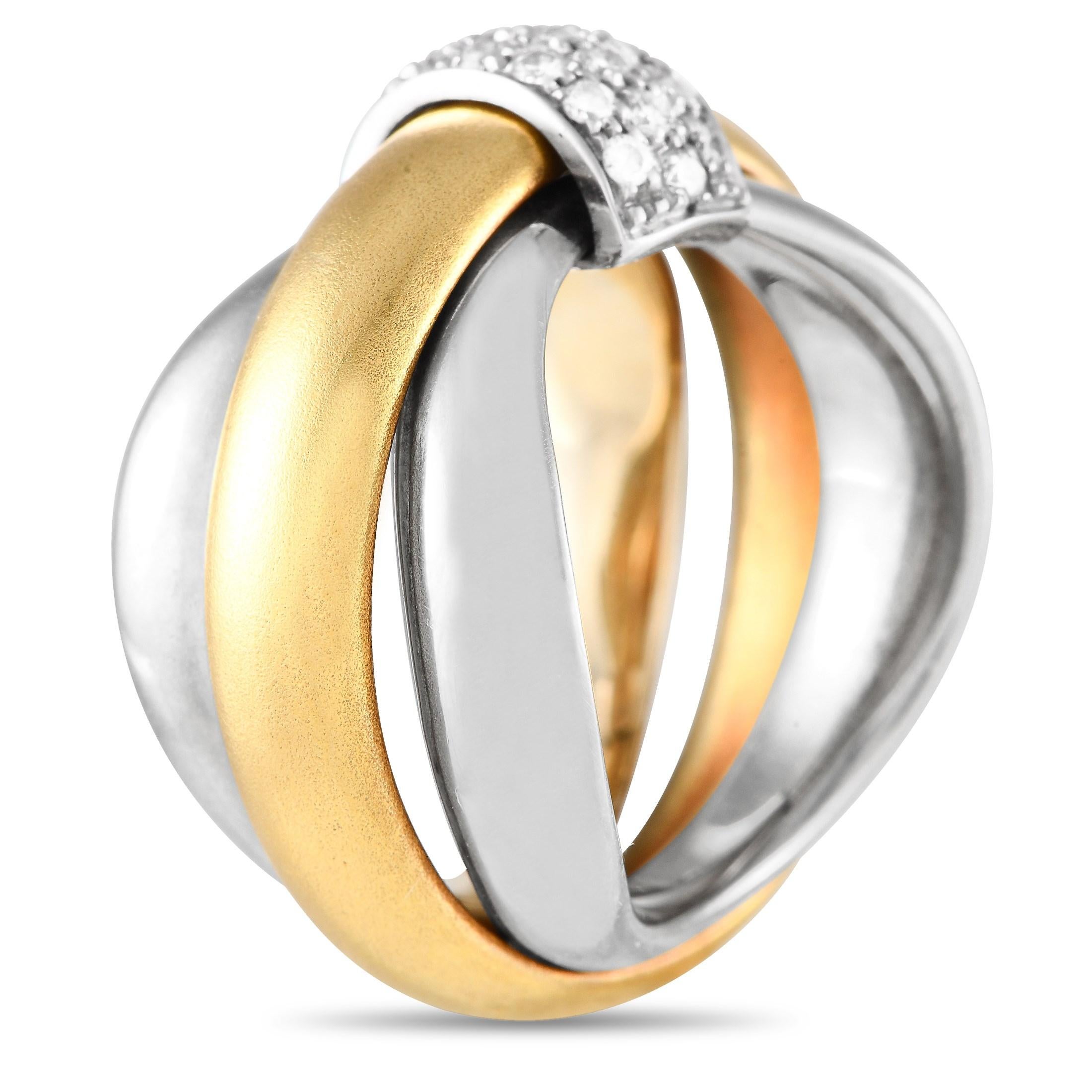 This exquisite Pomellato ring will never go out of style. On this elegant piece, multiple 18K yellow and white gold bands are seemingly tied together by a band of sparkling diamonds with a total weight of 0.20 carats. It features a 15mm wide band