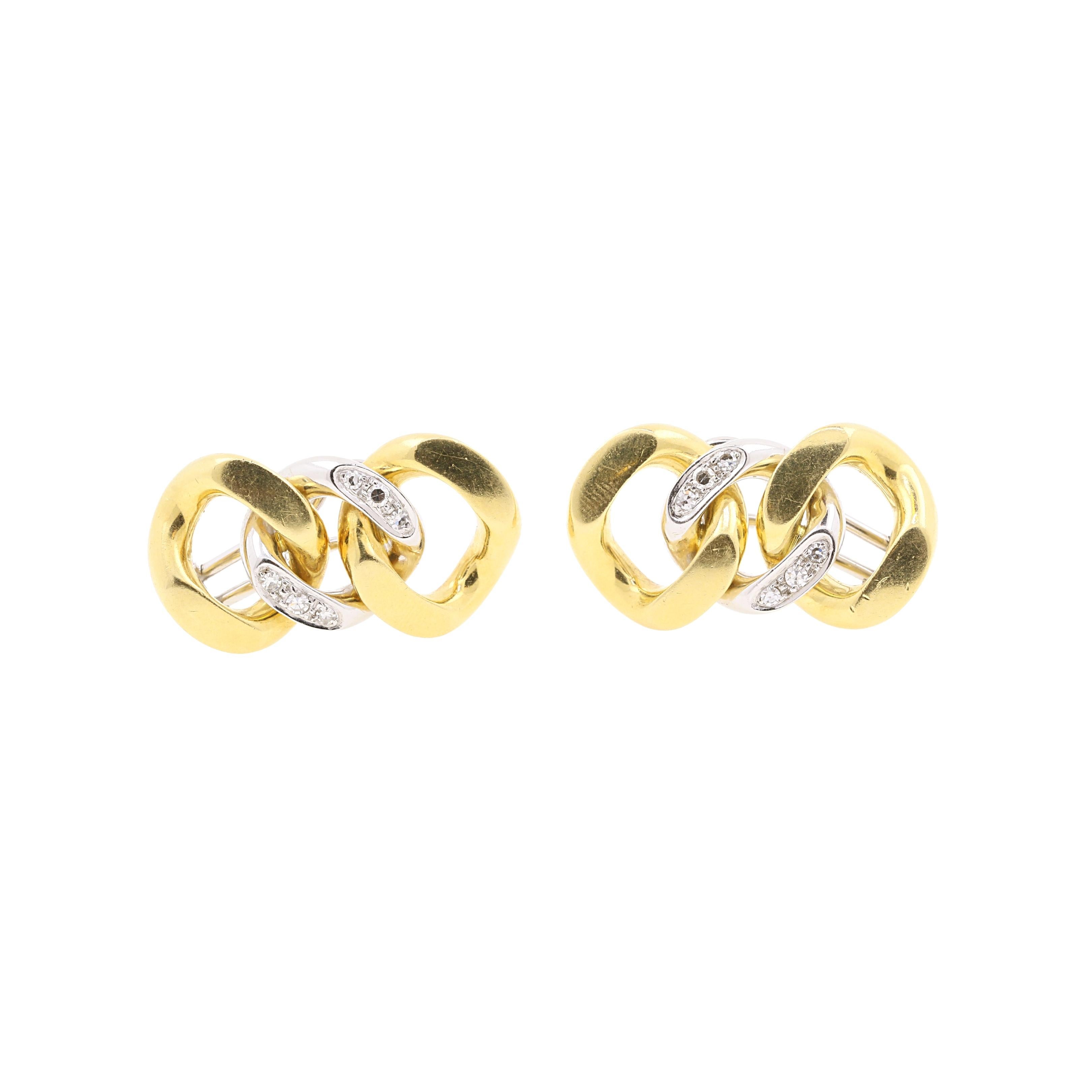 An iconic Pomellato pair of earrings straight from the brand early beginning!
18k Yellow and White gold Earrings with diamonds. 
Earrings composed by three 