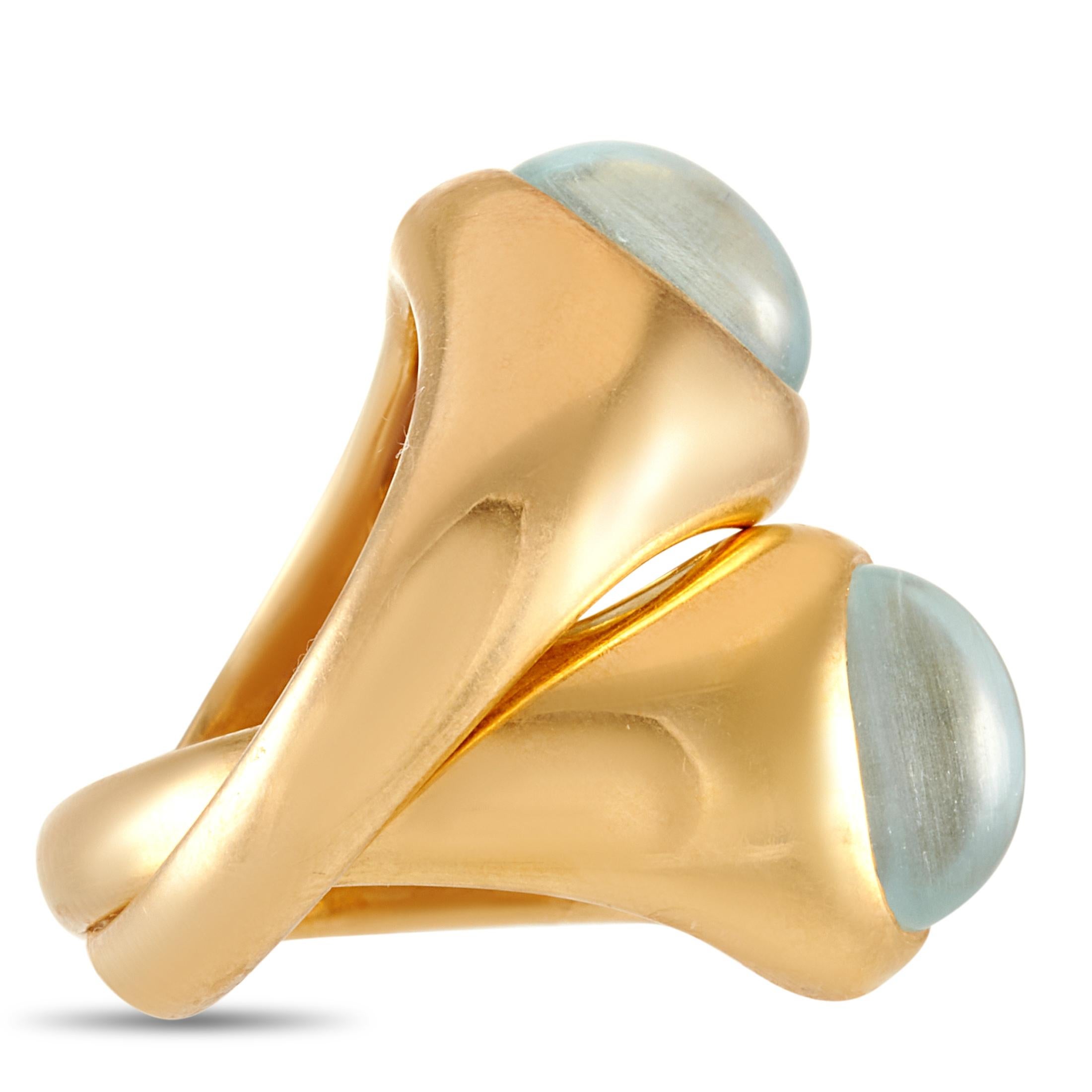 This Pomellato ring is made of 18K yellow gold and embellished with aquamarines. The ring weighs 19.5 grams and boasts band thickness of 7 mm and top height of 8 mm, while top dimensions measure 13 by 9 mm.
 
 Offered in estate condition, this