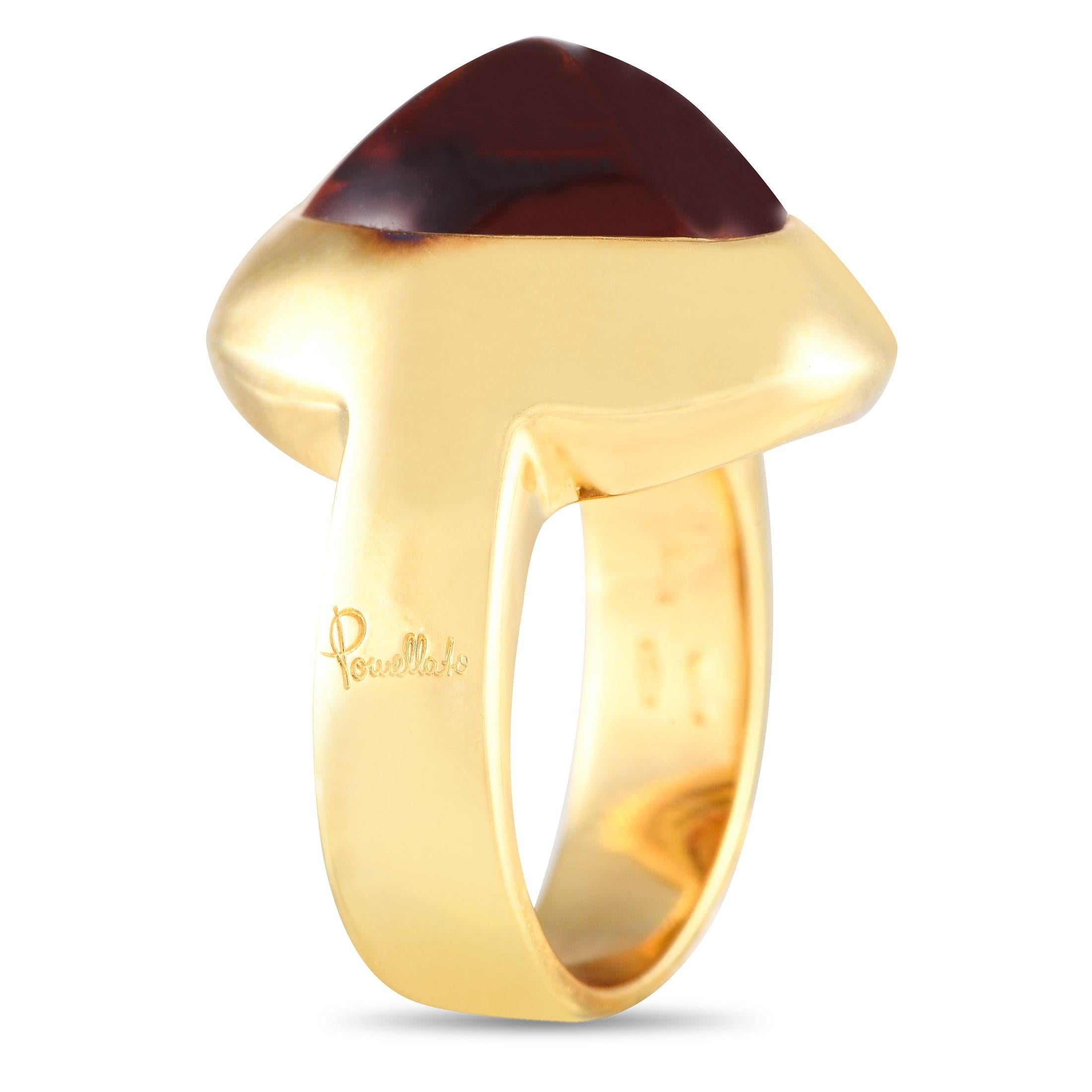 An opulent 18K yellow gold setting and a warm citrine center stone complement each other beautifully on this impressive Pomellato ring. Ideal for anyone with a sophisticated sense of style, this piece features a 5mm wide band and a 10mm top