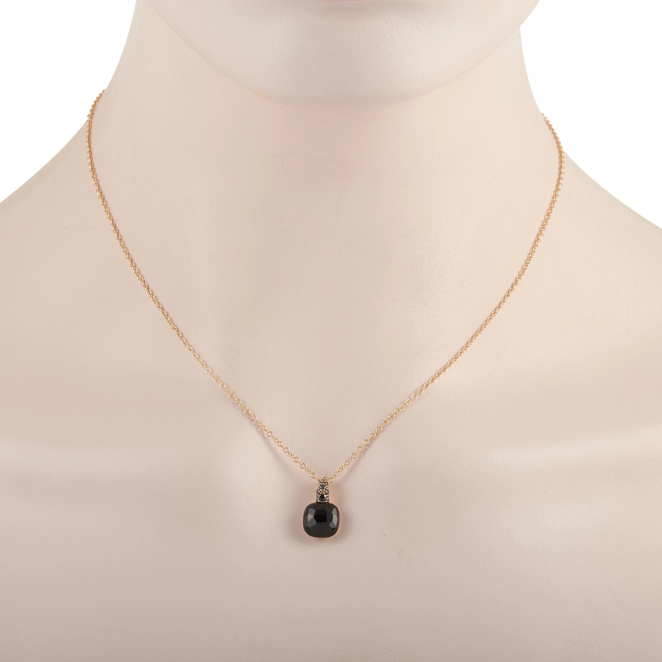 Dramatic and extremely captivating, the Pomellato 18K Yellow Gold Diamond and Black Onyx Necklace will charm you with its faceted black onyx pendant suspending from a bail covered in treated black diamonds. Holding the bewitching pendant is 17 inch