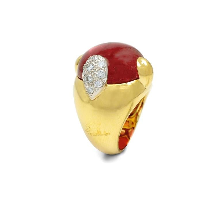 DESIGNER: Pomellato
RING SIZE: 6 1/2
BAND WIDTH: 6 mm
METAL: 18KT Yellow Gold
GENDER: Ladies
FEATURES: A pink Tourmaline cabochon set  within a dome accented by three 18KT yellow gold prongs and one 18KT white gold Diamond set prong, completed by a