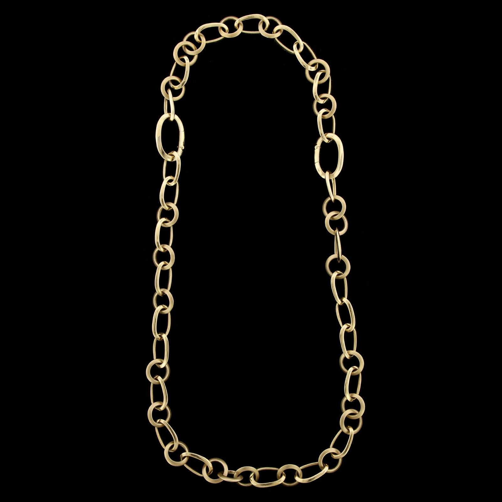 Pomellato 18K Yellow Gold Necklace and Bracelet. The convertible necklace and bracelet are
designed with oval and circular polished and textured links, necklace 19