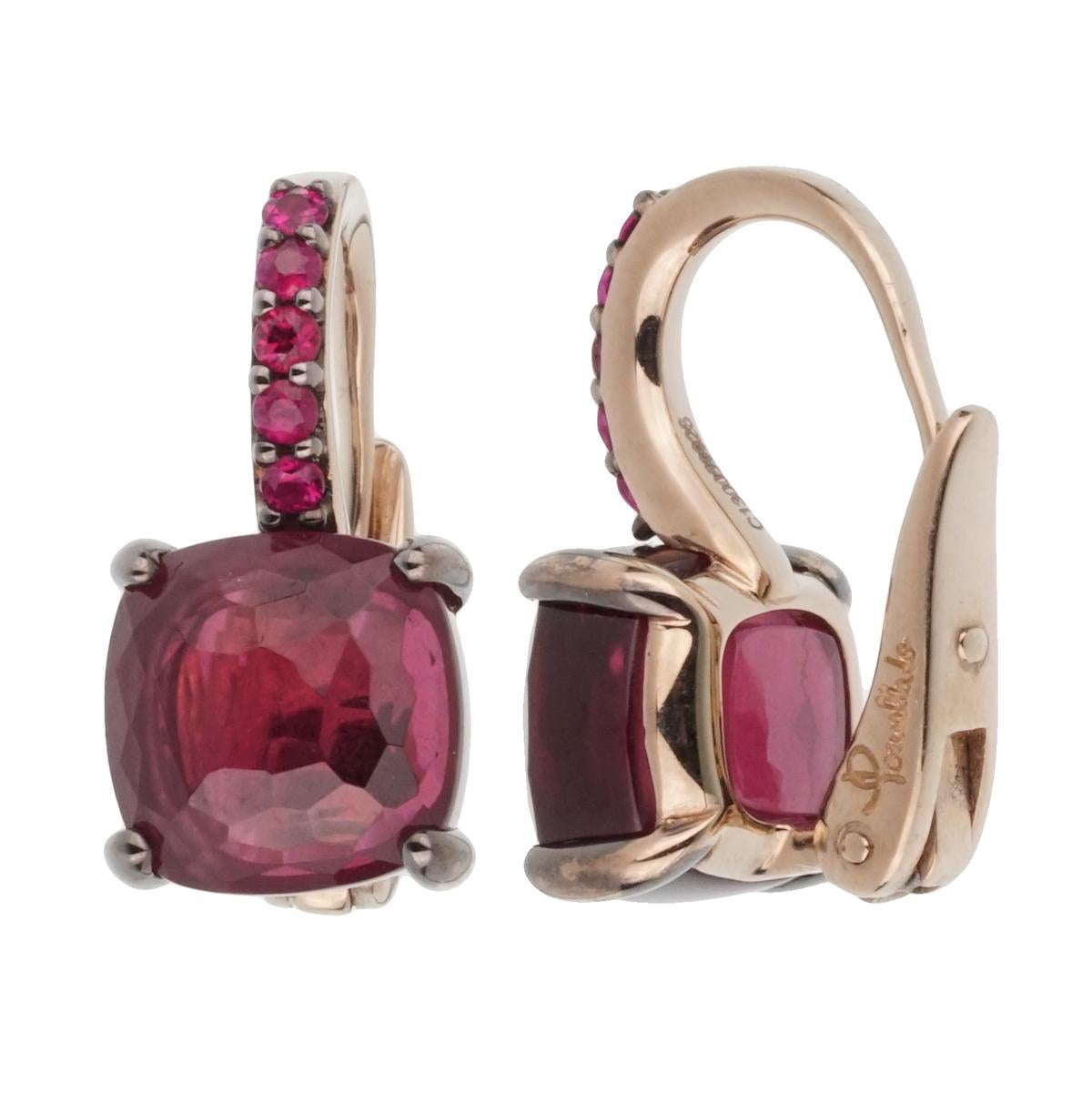 A chic set of brand new Pomellato earrings set with 5.44ct total weight in Rhodolite, adorned by .18ct Ruby in white gold.

Pomellato Retail Price: $8,750
Sku: 2197