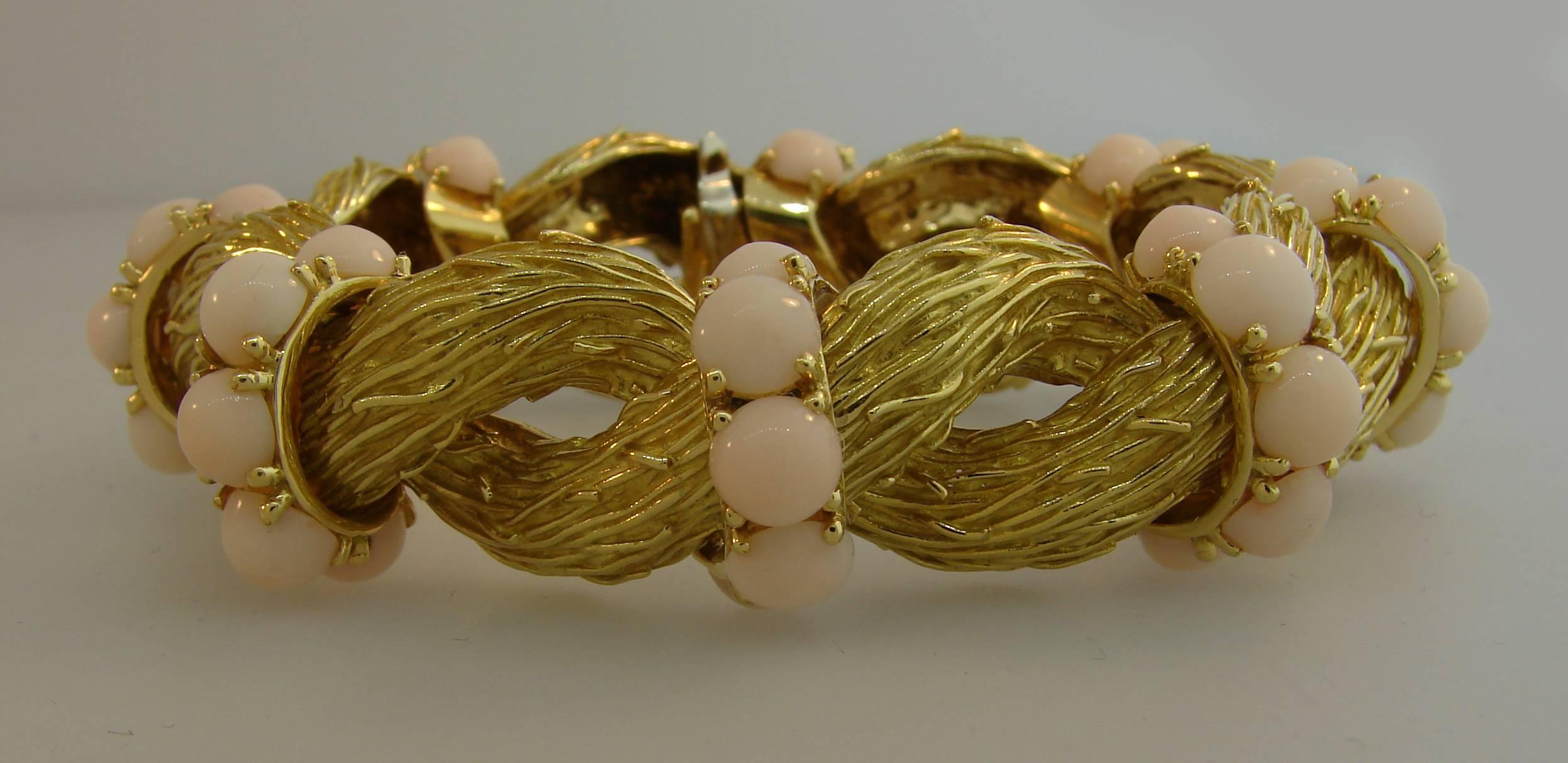 Nice and substantial bracelet created by Italian jewelry house Pomellato in the 1950's. Chic, stylish and wearable piece that is a great addition to your jewelry collection!
The bracelet is made of 18 karat yellow and accented with angel skin coral
