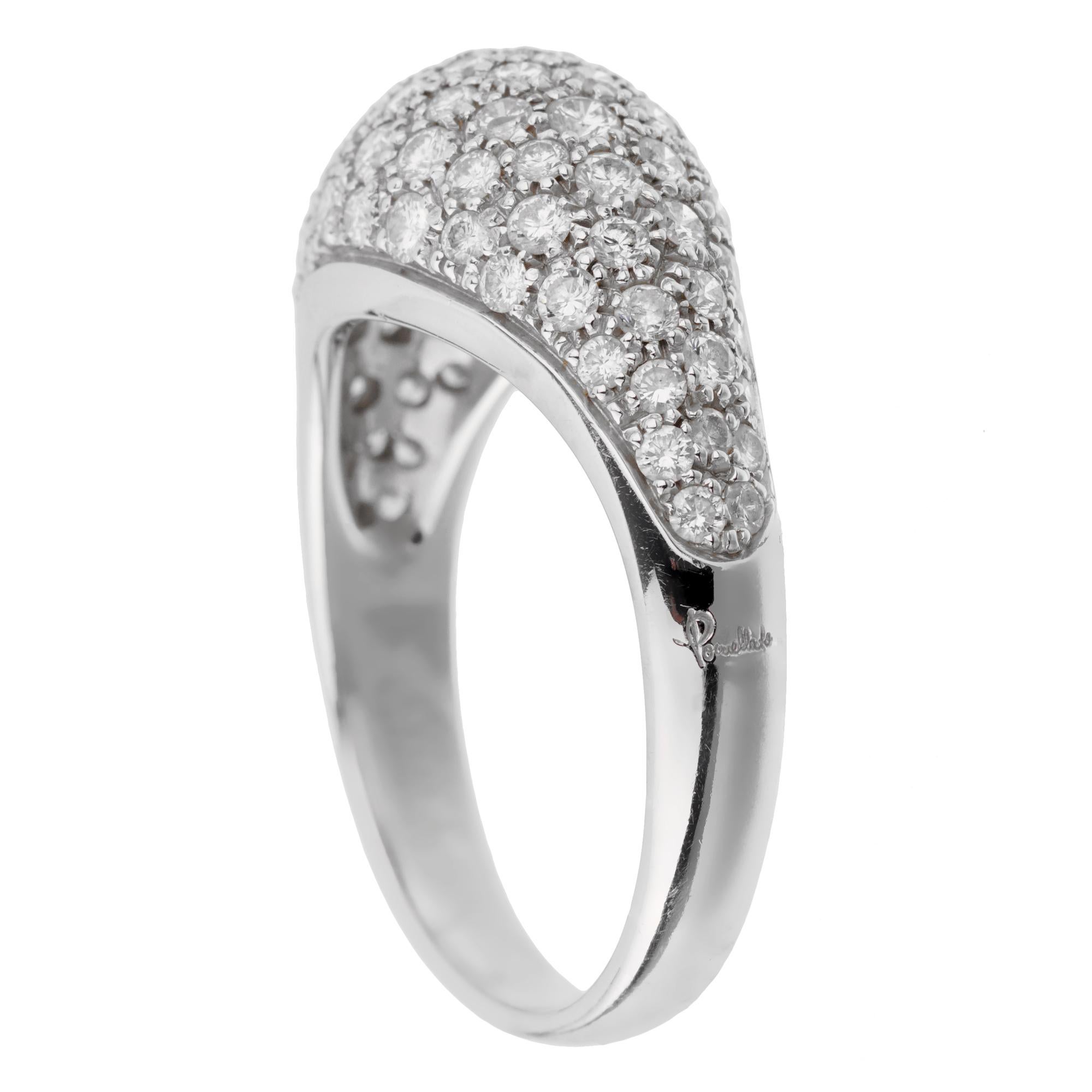 A timeless Pomellato cocktail ring in a bombe design showcasing round brilliant cut diamonds in shimmering 18k white gold. The ring measures a size 9 1/4 and can be resized.