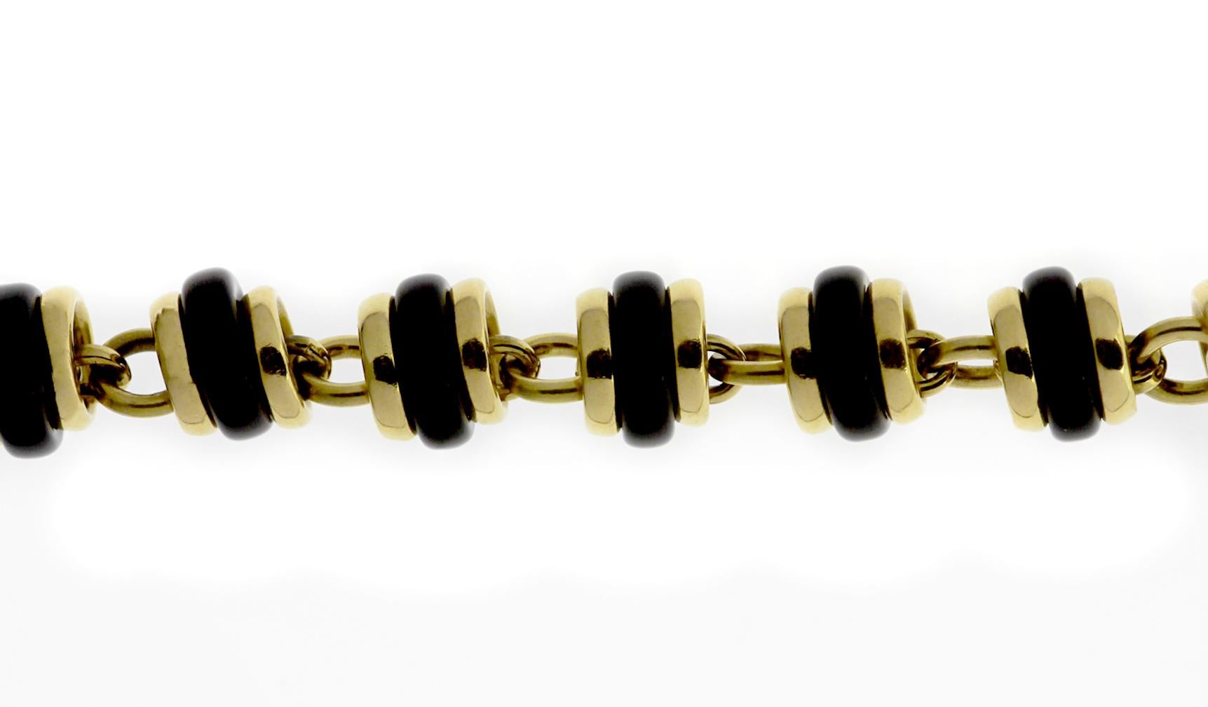Modern Pomellato Bracelet with Onyx Ring Shaped Beads in 18 Carat Yellow Gold For Sale