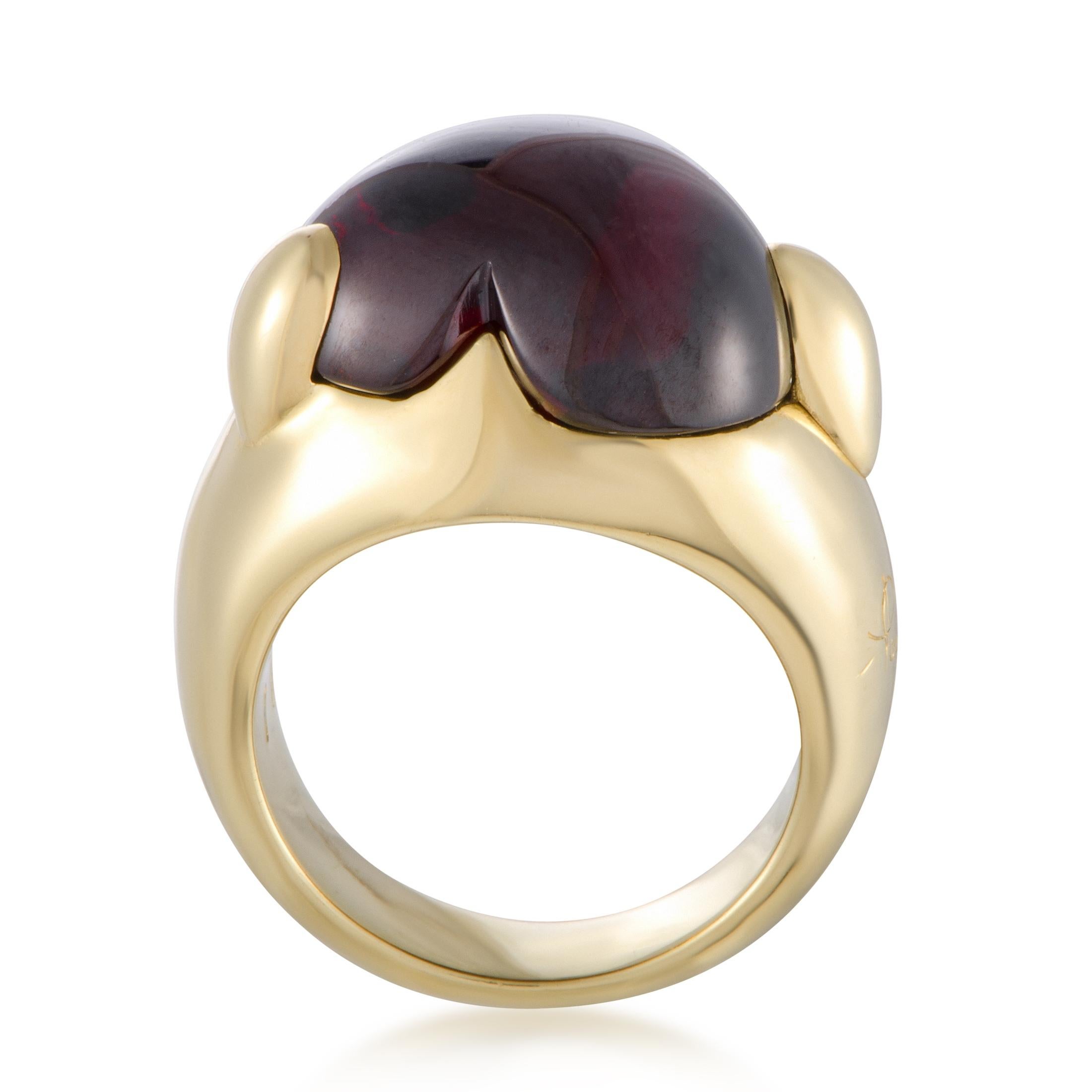 The compelling garnet is marvelously complemented by the luxuriously radiant 18K yellow gold in this stunning ring that offers a strikingly fashionable look. The ring is designed by Pomellato and weighs 20 grams.
Ring Top Dimensions: 16mm x 20mm