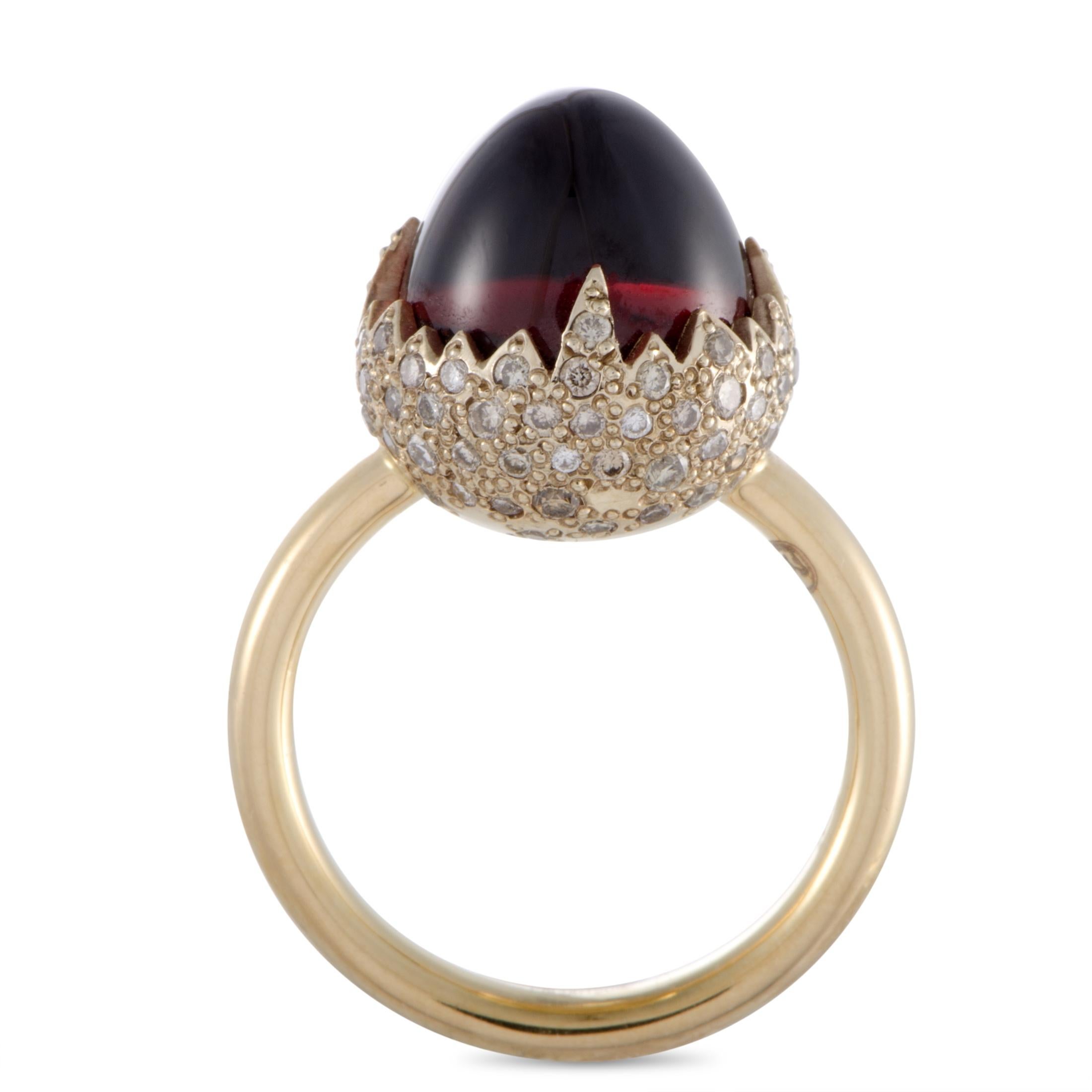 This fabulous 18K yellow gold ring by Pomellato boasts an incredibly extravagant appeal. The beautifully ring is embellished with a sublime garnet and 0.59ct of sparkling diamonds
Ring Top Dimensions: 12mm x 12mm