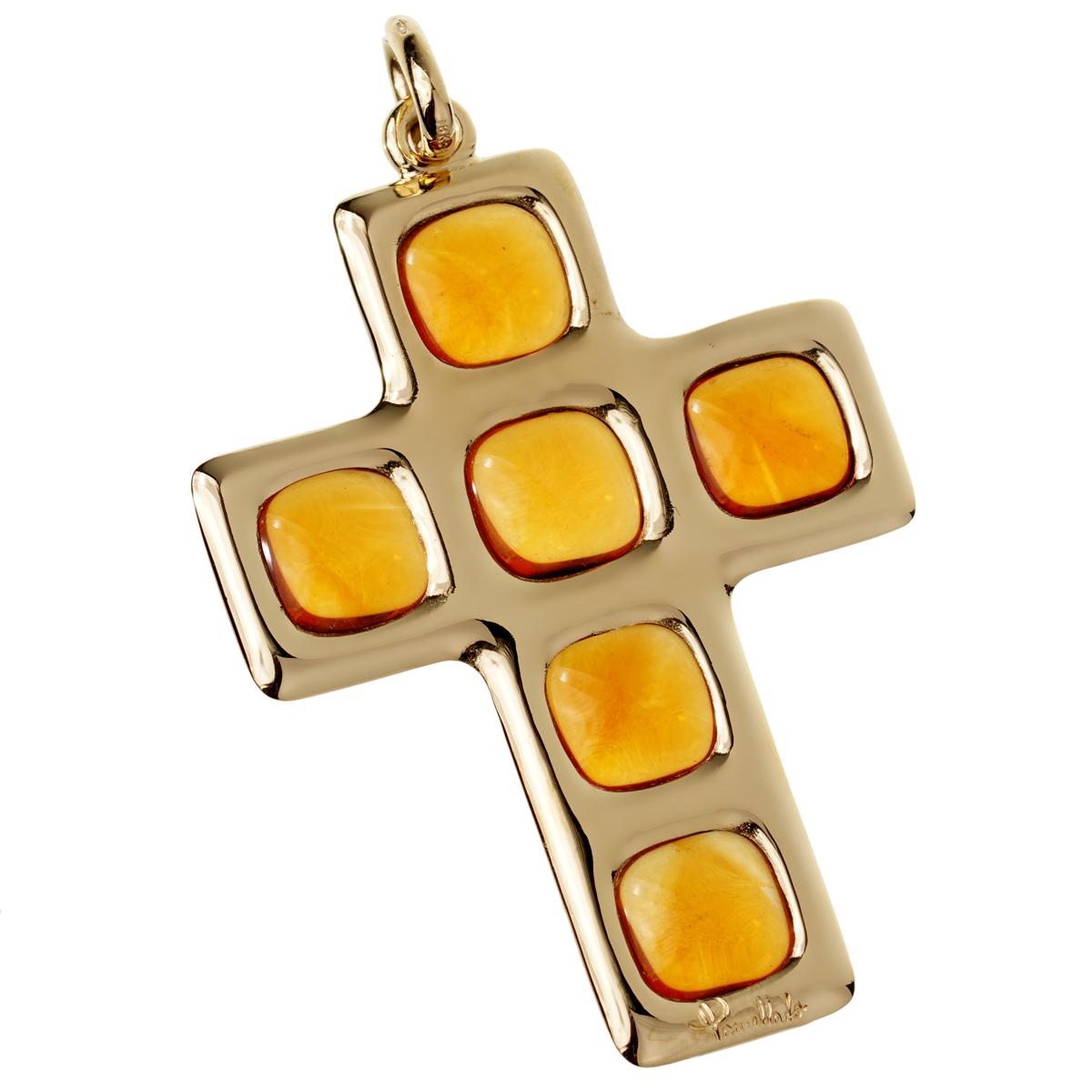 A fabulous Pomellato cross pendant showcasing 5 cabochon cut citrine stones weighing 27ct in 18k yellow gold. The pendant measures 2.51