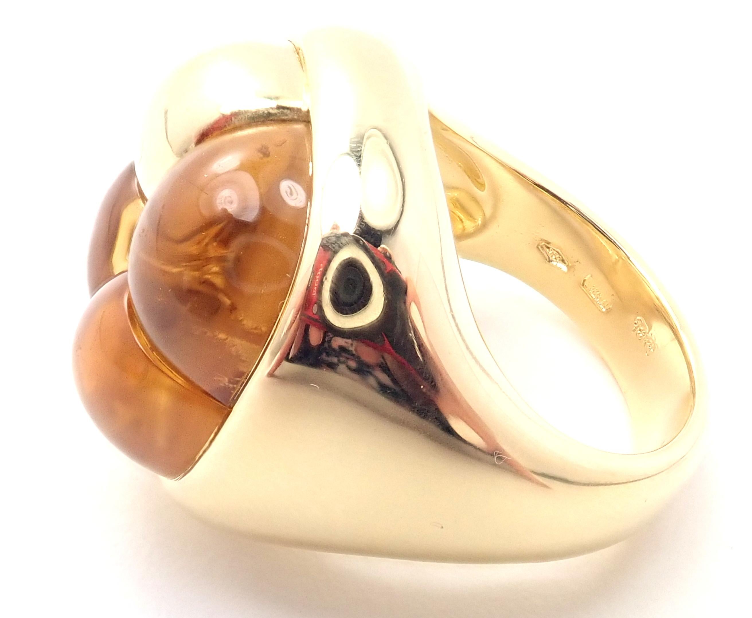 18k Yellow Gold Citrine Large Ring by Pomellato.
With 3 citrine stones.
Details: 
Weight: 28.6 grams
Ring Size: 6.5
Width: 21mm to 6mm
Stamped Hallmarks: Pomellato 750 
*Free Shipping within the United States*
YOUR PRICE: $4,450
T2822oodd