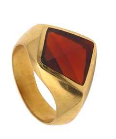 POMELLATO Cocktailring aus massivem 18 Karat Gelbgold mit facettiertem, facettiertem rotem Granat aus Kite