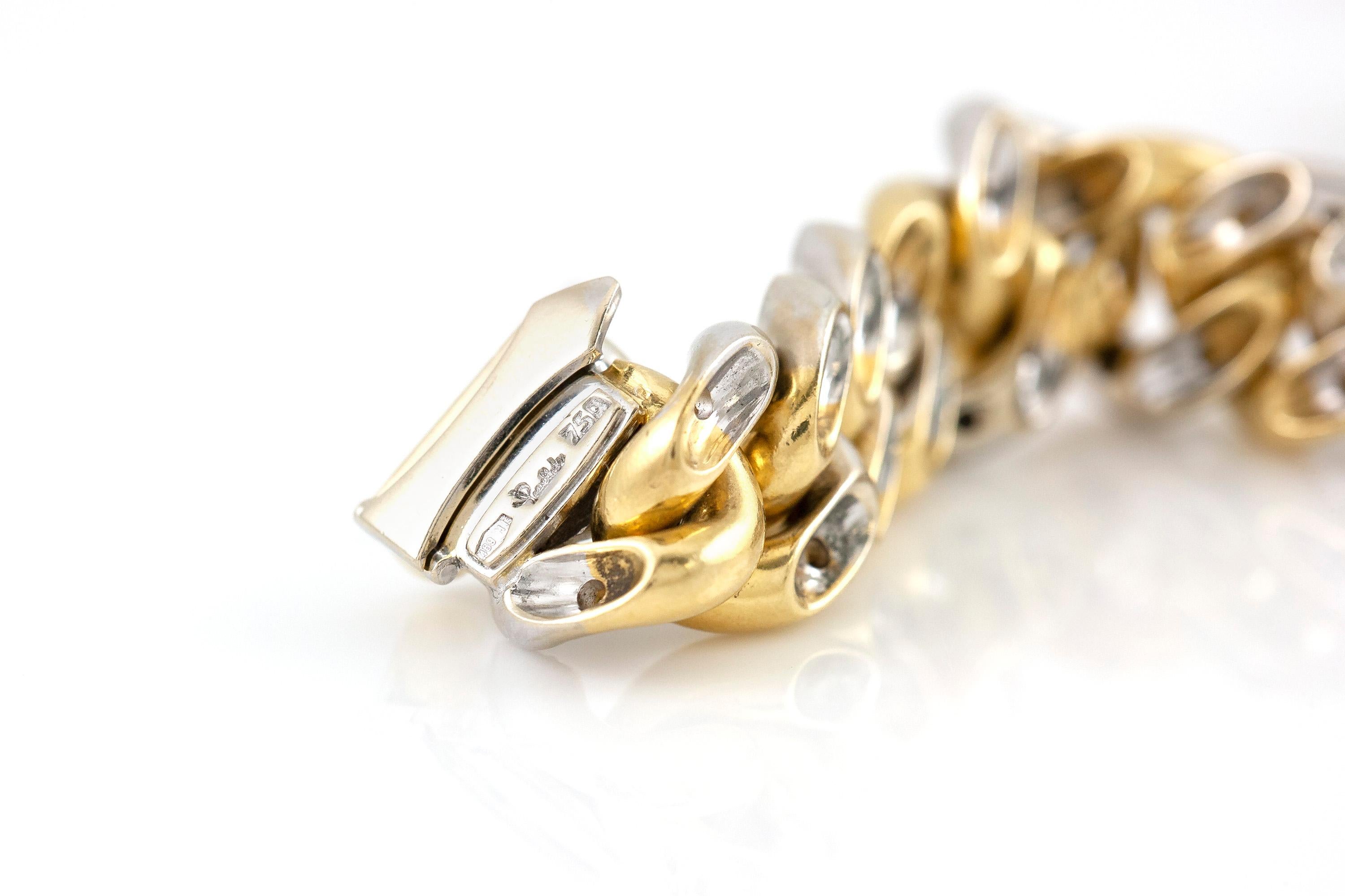 Pomellato is finely creftad in 18k yellow gold and white gold with diamonds weighing approximately total of 4.00 and the bracelet is weighing approximately total of 69.4 dwt.        signed by Pomellato.                                               