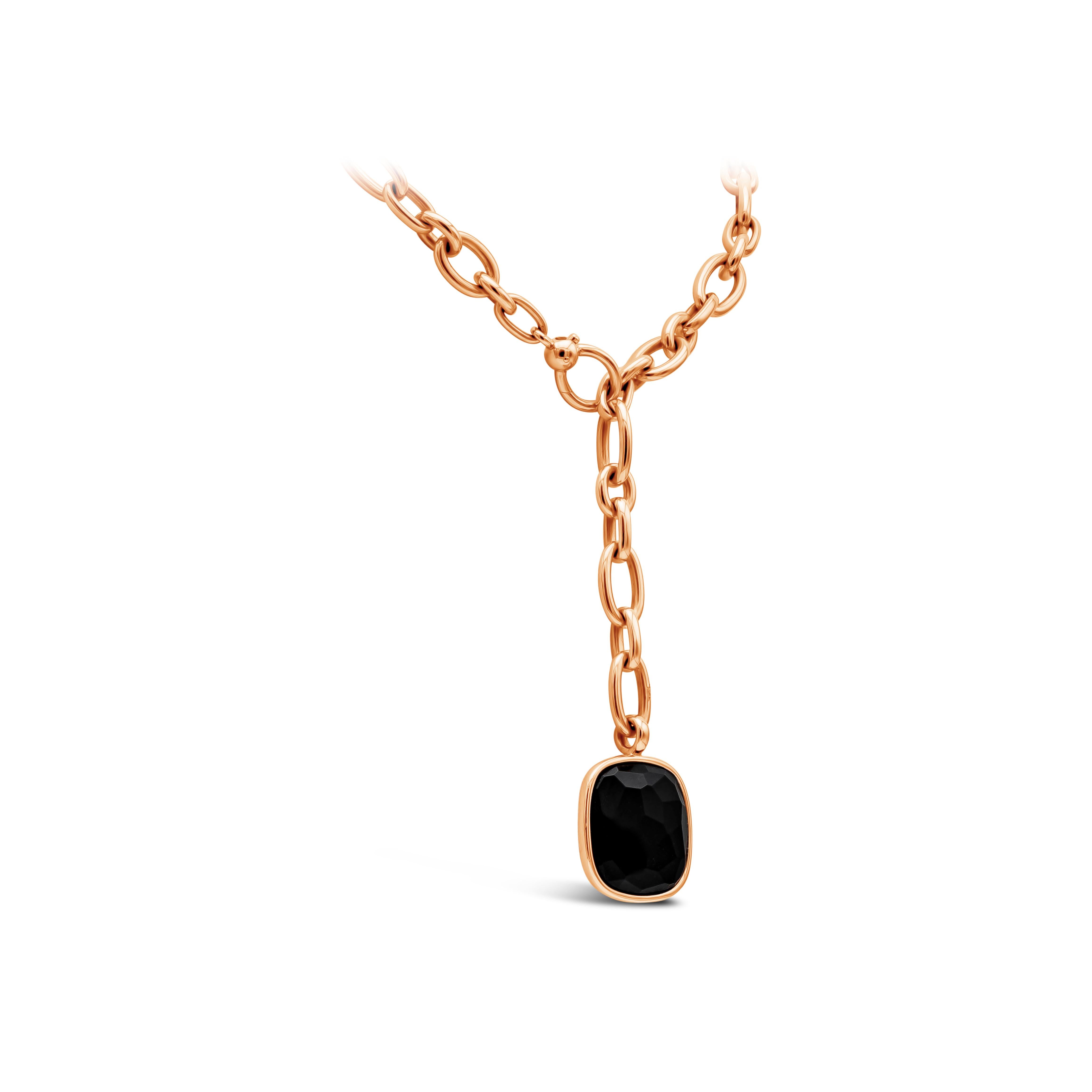 A fabulous and authentic necklace designed by Pomellato showcasing a faceted cushion cut black jet pendant in 18 karats rose gold chain links. From the Victoria Collection