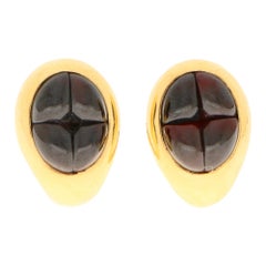 Vintage Pomellato Deep Red Garnet Clip-On Earrings Set in 18 Karat Yellow Gold