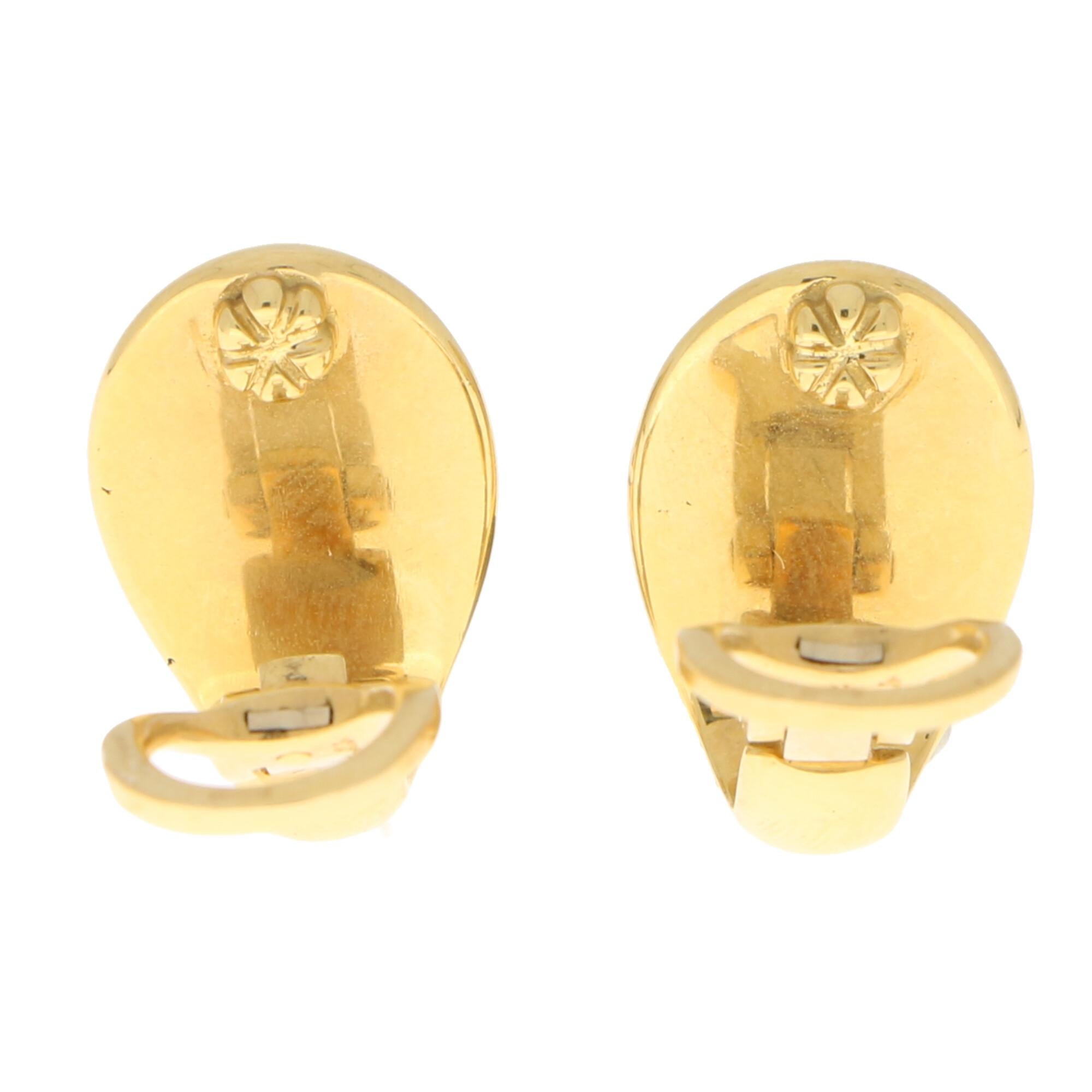 Cabochon Pomellato Deep Red Garnet Clip-On Earrings Set in 18 Karat Yellow Gold
