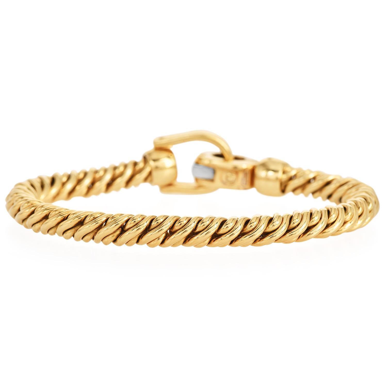 Pomellato Diamond 18K Gold Rope Chain Hardware Link Bracelet

Presenting a beautiful Wide Bracelet forged in 18K Yellow and white gold. The bracelet has a natural diamond Prong set in White gold. 

Secured with a fold-over Jewelry Clasp. 

Metal: