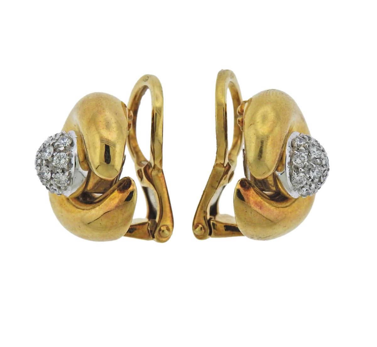 Pair of day & night 18k gold Pomellato earrings, set with approx. 0.28ctw in G/VS diamonds. Centers can be worn as studs.  Earrings are 15mm x 15mm, studs (centers) are 7mm in diameter, weigh 16.6 grams. Marked: 750, Pomellato.