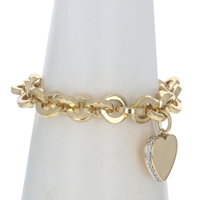 Marke: Pomellato

Metallgehalt: 18k Gelbgold & 18k Weißgold

Informationen zu Stein
Natürliche Diamanten
Karat(e): .60ctw
Schliff: Runder Brillant
Farbe: F - G
Reinheit: VS1 - VS2

Karat gesamt: .60ctw

Verschlusstyp: Druckknopf-Verschluss
Thema: