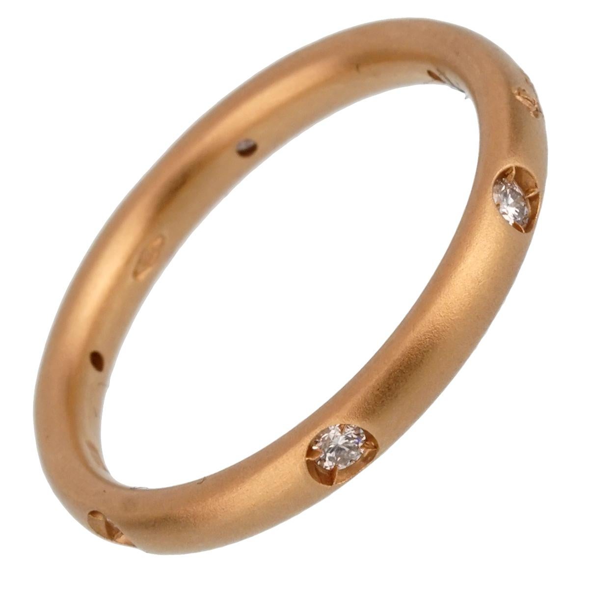 A chic brand new Pomellato diamond ring adorned with round brilliant cut diamonds in 18k rose gold. The ring measures a size 5 3/4

Sku: 2338