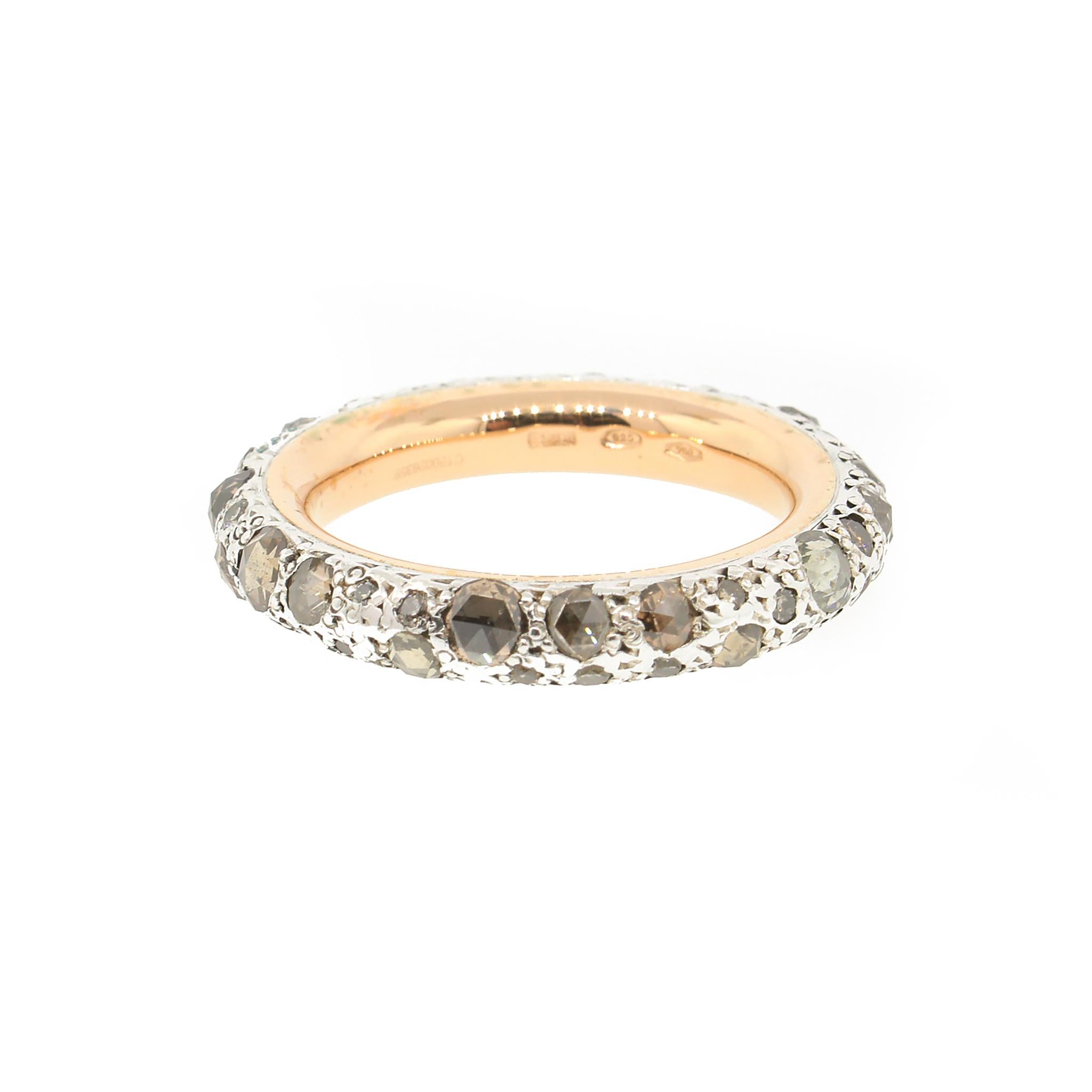 18 kt Yellow gold, Sterling Silver
Diamond: 1.91 ct twd
Diamond Hue: Brown Rose Cut Diamonds
Clarity: Slightly Included
Total Weight: 6.9 grams
Band Width: 4 mm
Ring Size: 7.75