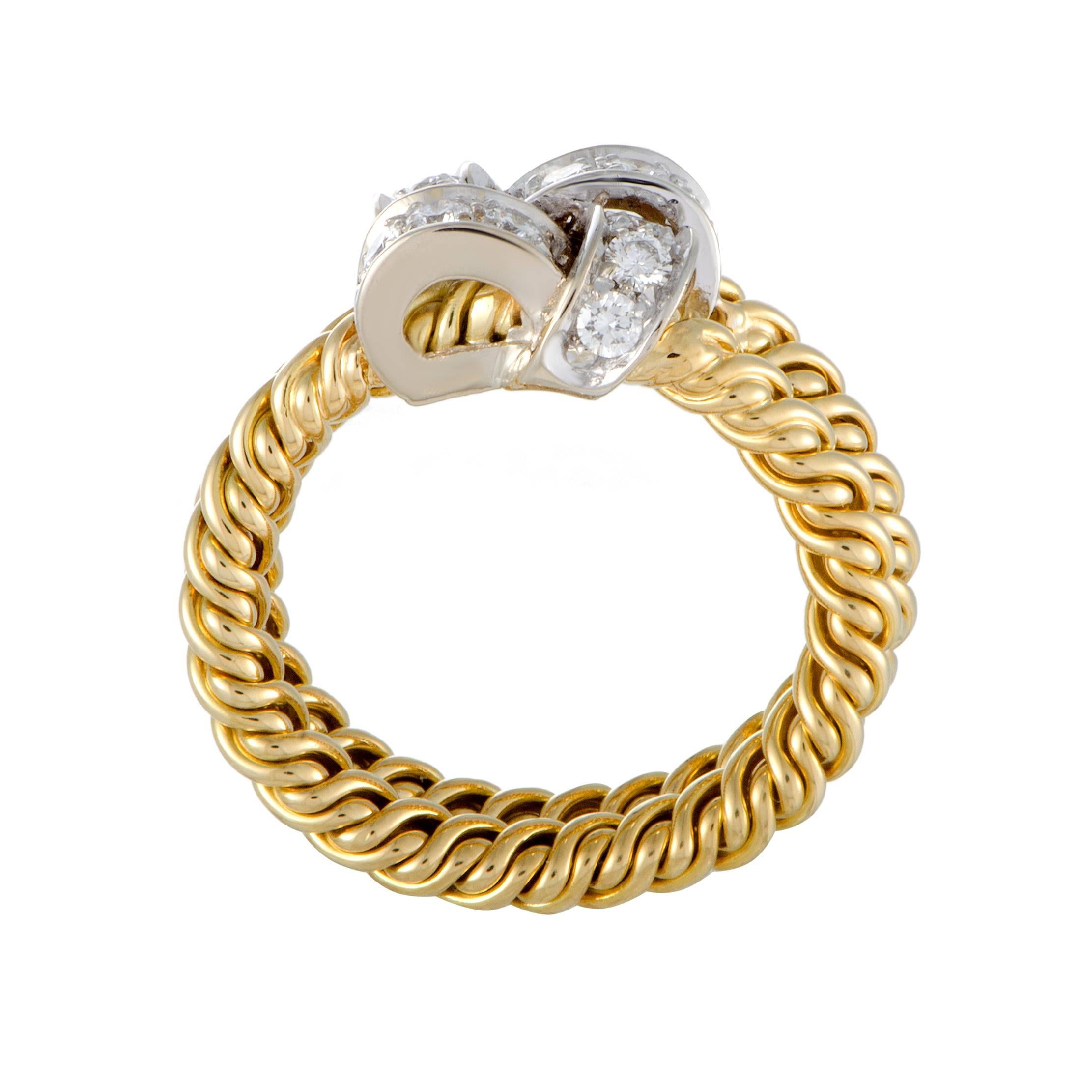 Boasting intricate woven structure that is presented in an eye-catching blend of 18K yellow and 18K white gold, this stunning ring offers a delightfully stylish appearance. The ring is designed by Pomellato and it is embellished with 0.60 carats of